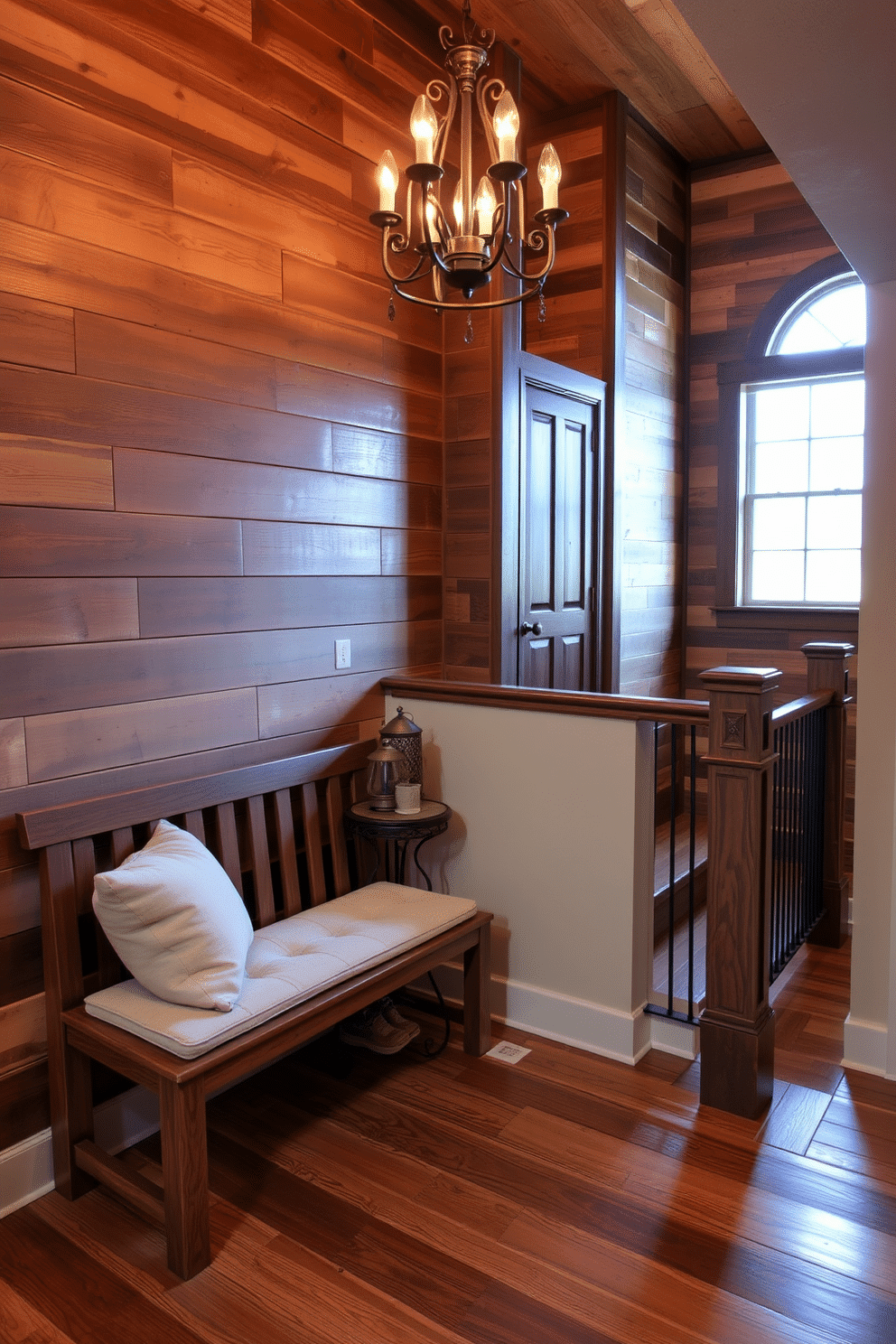 A cozy rustic staircase landing features a wooden bench with plush cushions, inviting you to sit and enjoy the view. The walls are adorned with reclaimed wood paneling, and a vintage chandelier hangs above, casting a warm glow over the space. In the corner, a small side table holds a collection of rustic decor items, such as a lantern and a potted plant. Natural light filters in through a nearby window, illuminating the rich textures of the hardwood flooring.