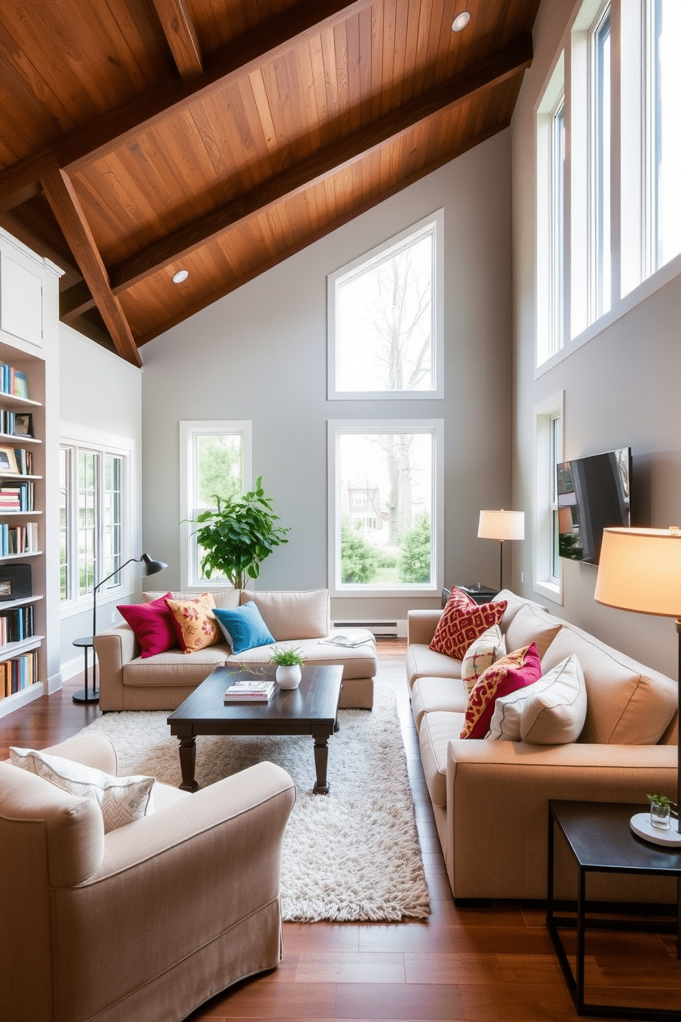 A cozy family room featuring a large, inviting sofa in a soft beige fabric, adorned with colorful throw pillows for a pop of color. The room is bathed in natural light from large windows, with a warm wood coffee table placed in front of the sofa, complemented by a plush area rug underneath. On one side of the room, a built-in bookshelf displays an array of books and decorative items, while the opposite wall showcases a modern media console with a sleek television. Soft ambient lighting from floor lamps creates a welcoming atmosphere, making it the perfect space for family gatherings and relaxation.