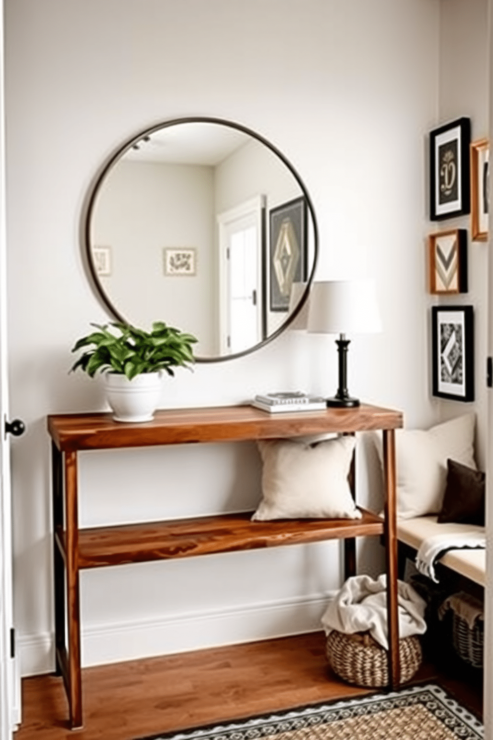 A small entryway featuring a stylish console table made of reclaimed wood, adorned with a vibrant potted plant for a touch of greenery. The walls are painted in a soft pastel hue, and a large round mirror hangs above the table to reflect light and create a sense of space. To the side, a small bench with plush cushions offers a cozy seating area, while a woven basket underneath provides storage for shoes. A collection of framed artwork adds personality to the walls, enhancing the welcoming vibe of the entryway.