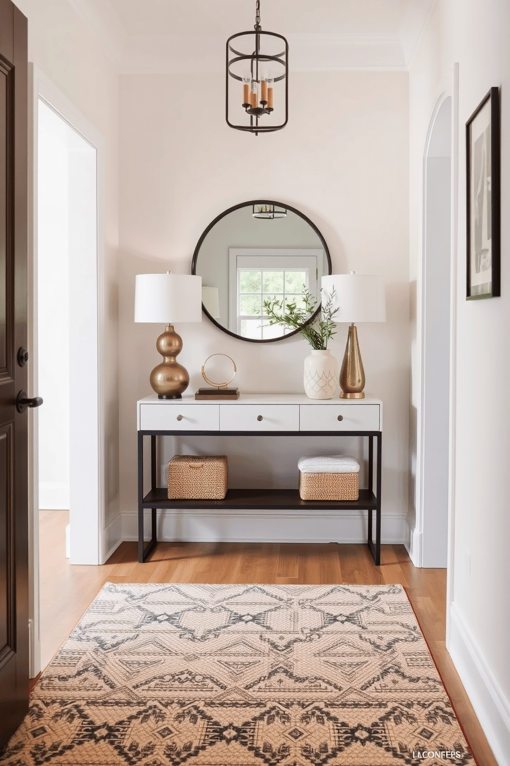 A small foyer with a charming aesthetic features a textured area rug that defines the entry space, adding warmth and comfort. The walls are painted in a soft, welcoming hue, complemented by a sleek console table adorned with decorative accents and a stylish mirror above it.