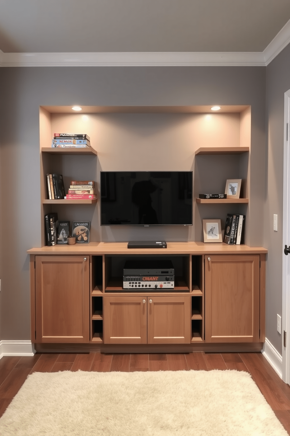 A cozy small game room features built-in shelves flanking a sleek console, providing ample storage for games and accessories. The walls are painted in a warm gray, and a plush area rug anchors the space, creating a welcoming atmosphere for friends and family.