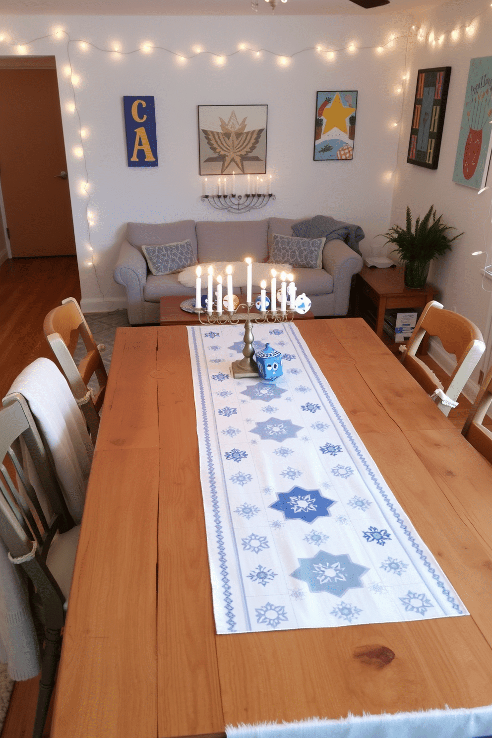 A festive Hanukkah-themed table runner stretches elegantly across a rustic wooden dining table, adorned with subtle blue and silver patterns that reflect the holiday's spirit. Surrounding the table are mismatched chairs, each draped with a cozy throw, creating a warm and inviting atmosphere perfect for family gatherings. In the small living room, a beautifully decorated menorah takes center stage on the coffee table, surrounded by flickering candles and decorative dreidels. The walls are adorned with soft, twinkling fairy lights and colorful Hanukkah-themed artwork, enhancing the room's cheerful ambiance.