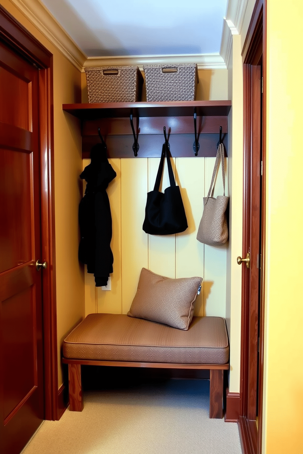 A cozy mudroom featuring wall-mounted hooks for easy access to coats and bags. The space is adorned with a bench upholstered in a soft, durable fabric, and the walls are painted in a warm, inviting color.