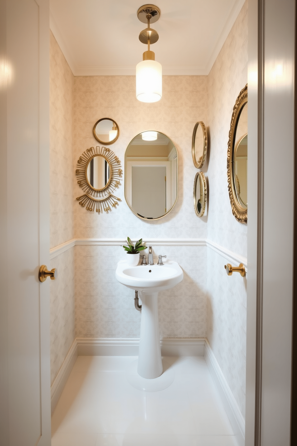 A small powder room features a stylish arrangement of decorative mirrors that reflect light, creating an illusion of spaciousness. The walls are adorned with soft, light-colored wallpaper, and a chic pedestal sink complements the elegant design. The floor is covered with glossy white tiles that enhance the room's brightness, while a sleek, modern light fixture illuminates the space. A small potted plant sits on the countertop, adding a touch of greenery and freshness to the overall aesthetic.