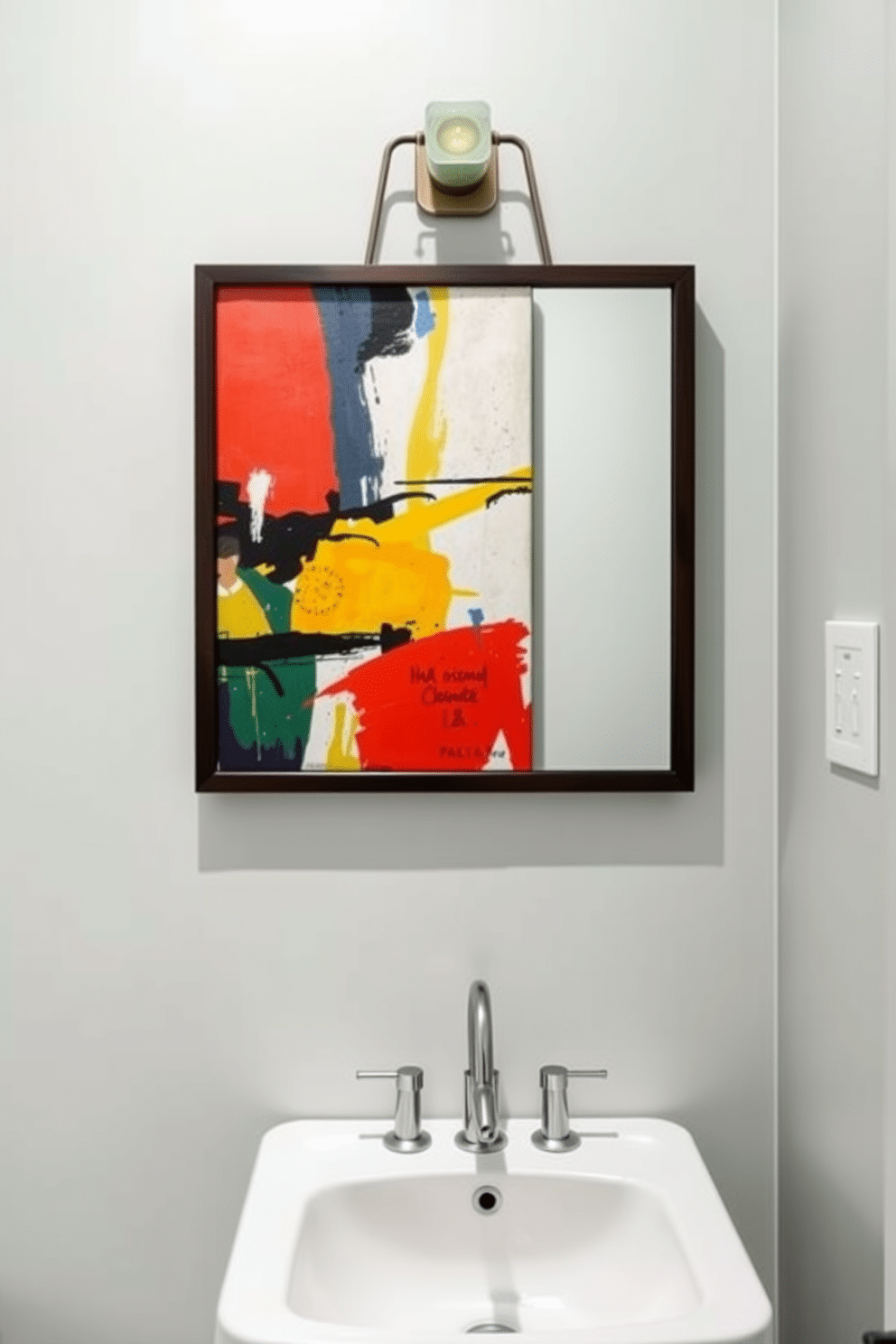 Artistic wall art for personality. A vibrant abstract painting in bold colors hangs on the wall, creating a focal point that reflects the homeowner's unique style. Small powder room design ideas. The space features a compact pedestal sink with a sleek, modern faucet, complemented by a stylish wall-mounted mirror that enhances the room's depth.