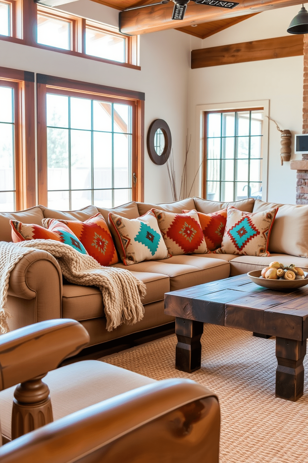 A cozy Southwestern family room featuring a large sectional sofa adorned with cushions showcasing vibrant geometric patterns in shades of terracotta, turquoise, and cream. A chunky knit throw in a complementary color drapes across the armrest, adding warmth and texture to the inviting space. The room is accented with rustic wooden furniture, including a reclaimed wood coffee table and a woven area rug that ties the color scheme together. Large windows allow natural light to flood the room, highlighting the earthy tones and creating a welcoming atmosphere for family gatherings.