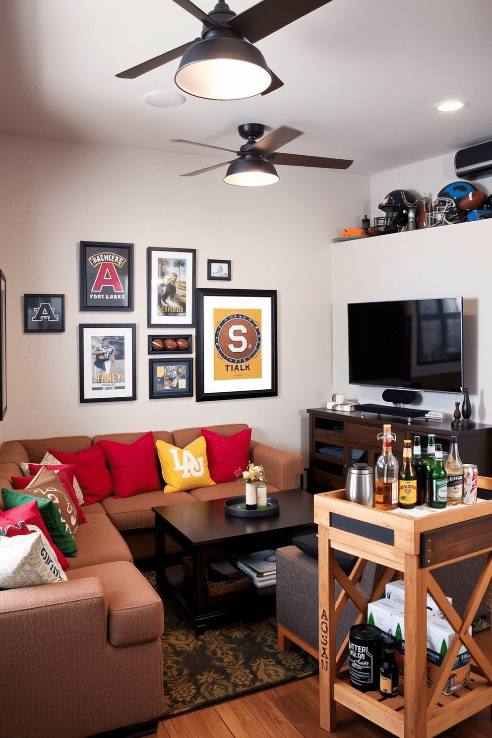 A cozy seating area features a plush sectional sofa adorned with team color cushions in vibrant hues. The walls are decorated with framed sports memorabilia, and a large flat-screen TV is mounted above a stylish media console. In the corner, a rustic wooden bar cart holds an assortment of drinks and snacks, perfect for game day gatherings. Soft lighting from industrial-style fixtures creates an inviting atmosphere for friends to enjoy the big game together.