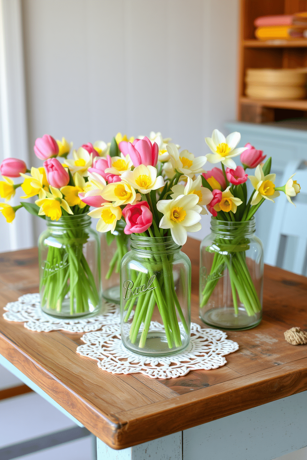 Vintage glass jars filled with fresh spring flowers sit on a rustic wooden table. The jars are arranged in varying heights, showcasing vibrant blooms like tulips and daffodils, creating a cheerful and inviting atmosphere. Delicate lace doilies are placed underneath each jar, adding a touch of elegance to the display. Soft pastel colors dominate the scene, enhancing the fresh and airy feel of spring decor.