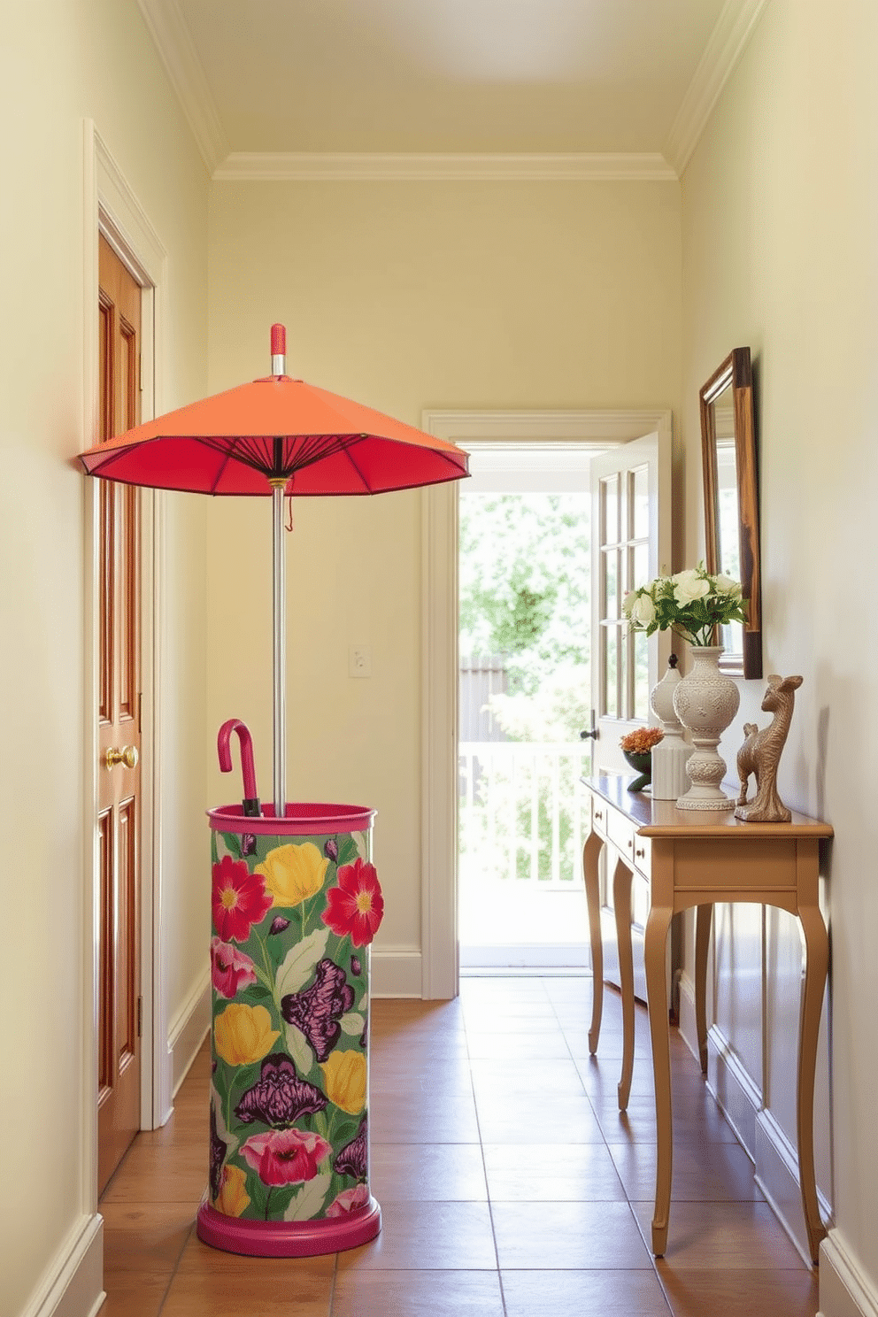 A brightly colored umbrella stand is positioned at the entrance of a sunlit hallway. The stand features a vibrant floral design that adds a cheerful touch to the space. The walls of the hallway are painted in a soft pastel hue, creating a fresh and inviting atmosphere. A narrow console table adorned with decorative items complements the umbrella stand beautifully.