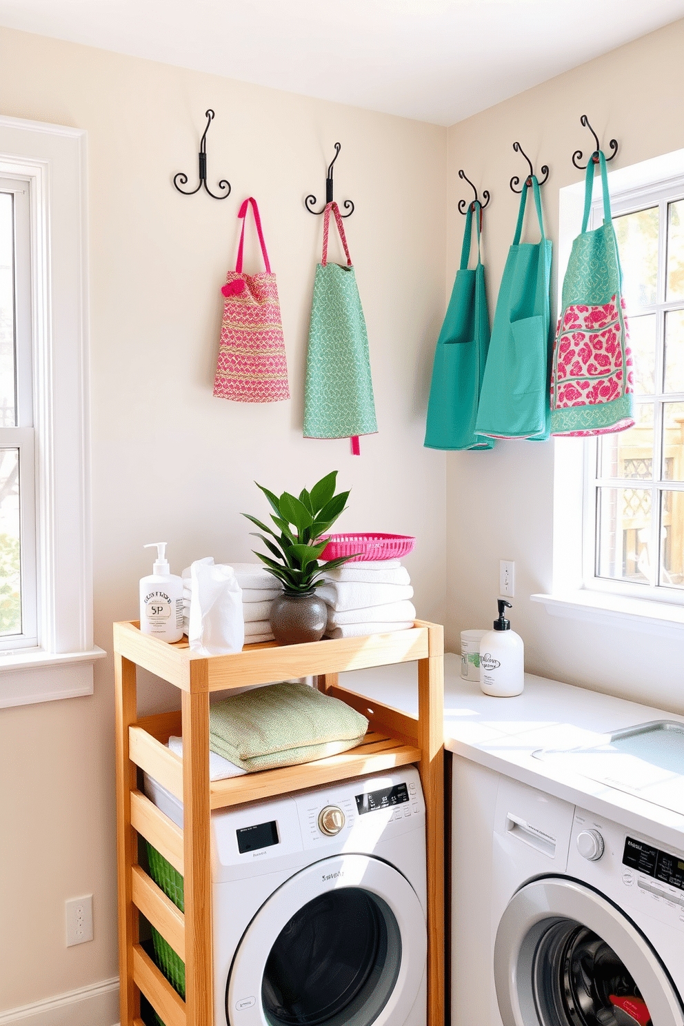 A bright and cheerful laundry room features a tiered cart made of natural wood, filled with neatly folded towels and colorful baskets. The walls are painted in a soft pastel hue, and a large window allows natural light to flood the space, enhancing the vibrant decor. On the countertop, a stylish plant sits next to a chic soap dispenser, adding a touch of greenery to the area. Decorative wall hooks display colorful aprons, creating an inviting atmosphere that inspires organization and creativity in laundry tasks.