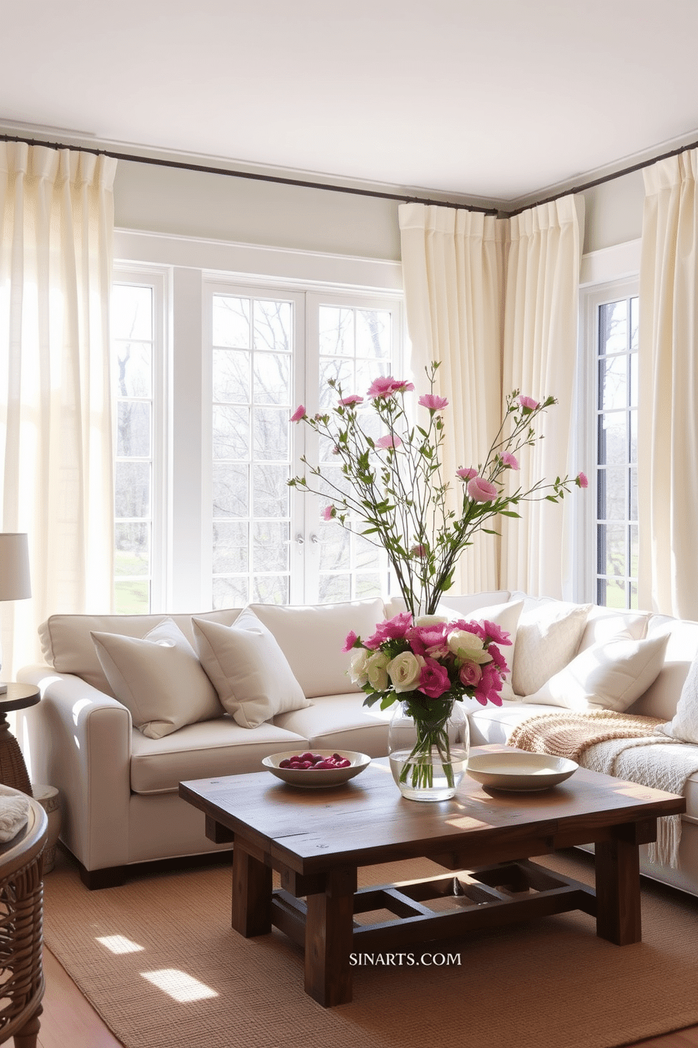 A bright and inviting spring living room filled with natural light. Light linen curtains drape elegantly over large windows, creating an airy atmosphere. A comfortable sofa adorned with pastel cushions is positioned around a rustic coffee table. Fresh flowers in a vibrant vase add a pop of color to the space, complementing the soft, neutral tones of the decor.