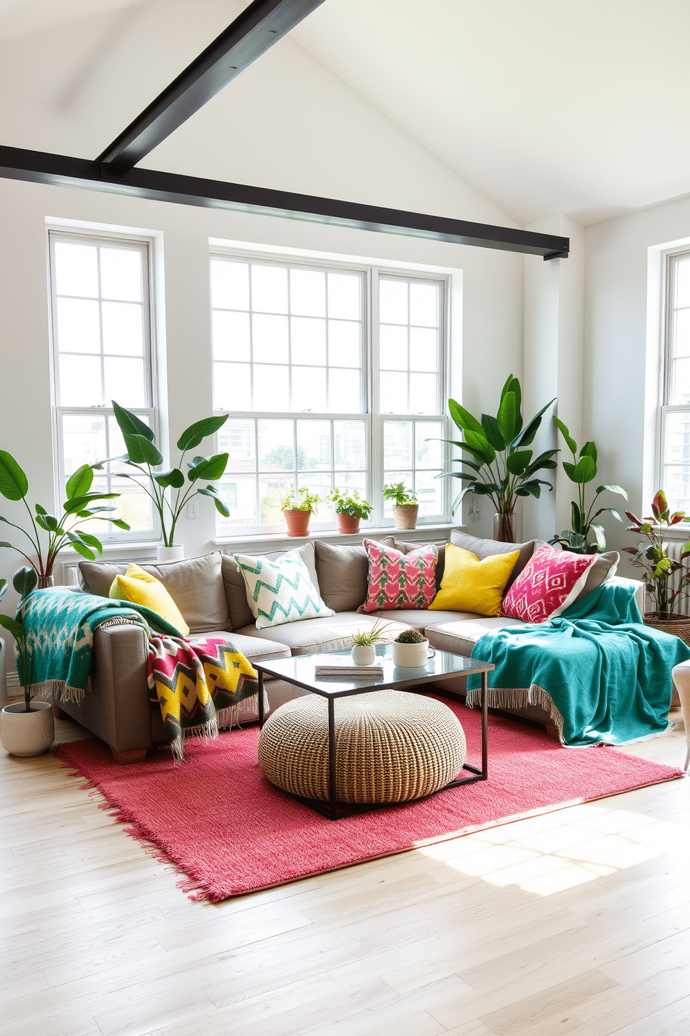 A bright and airy loft living space features a cozy sectional sofa adorned with playful patterned throw blankets in vibrant colors. Large windows let in natural light, highlighting the cheerful decor and the eclectic mix of cushions that add texture and warmth. The walls are painted in a soft pastel hue, creating a fresh and inviting atmosphere. Potted plants are strategically placed around the room, bringing a touch of nature indoors and enhancing the springtime vibe.