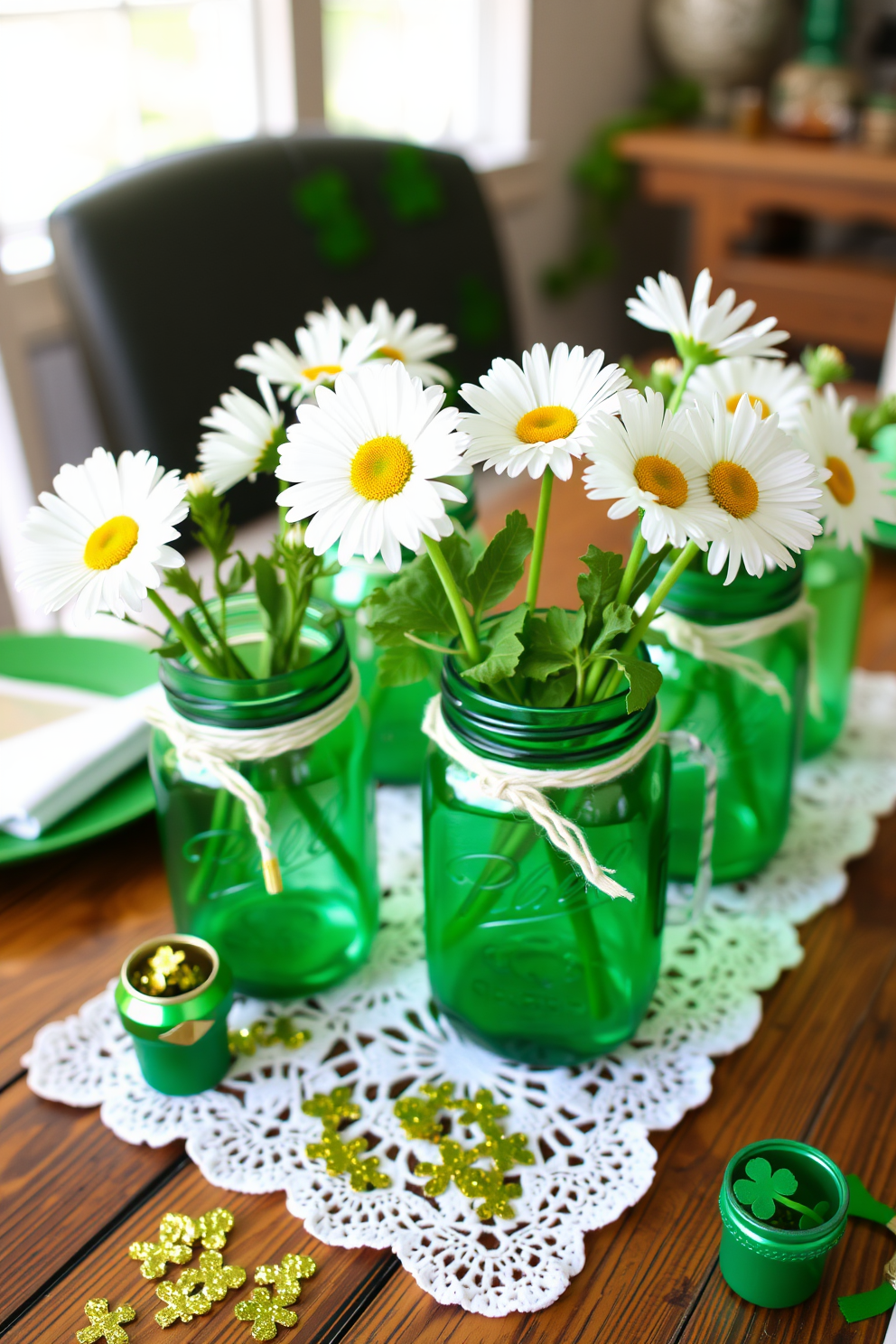 A festive St. Patrick's Day setting featuring green mason jar vases filled with fresh white daisies and sprigs of shamrock. The jars are arranged on a rustic wooden table adorned with a white lace tablecloth, surrounded by gold and green accents like glittering shamrock confetti and small decorative pots.