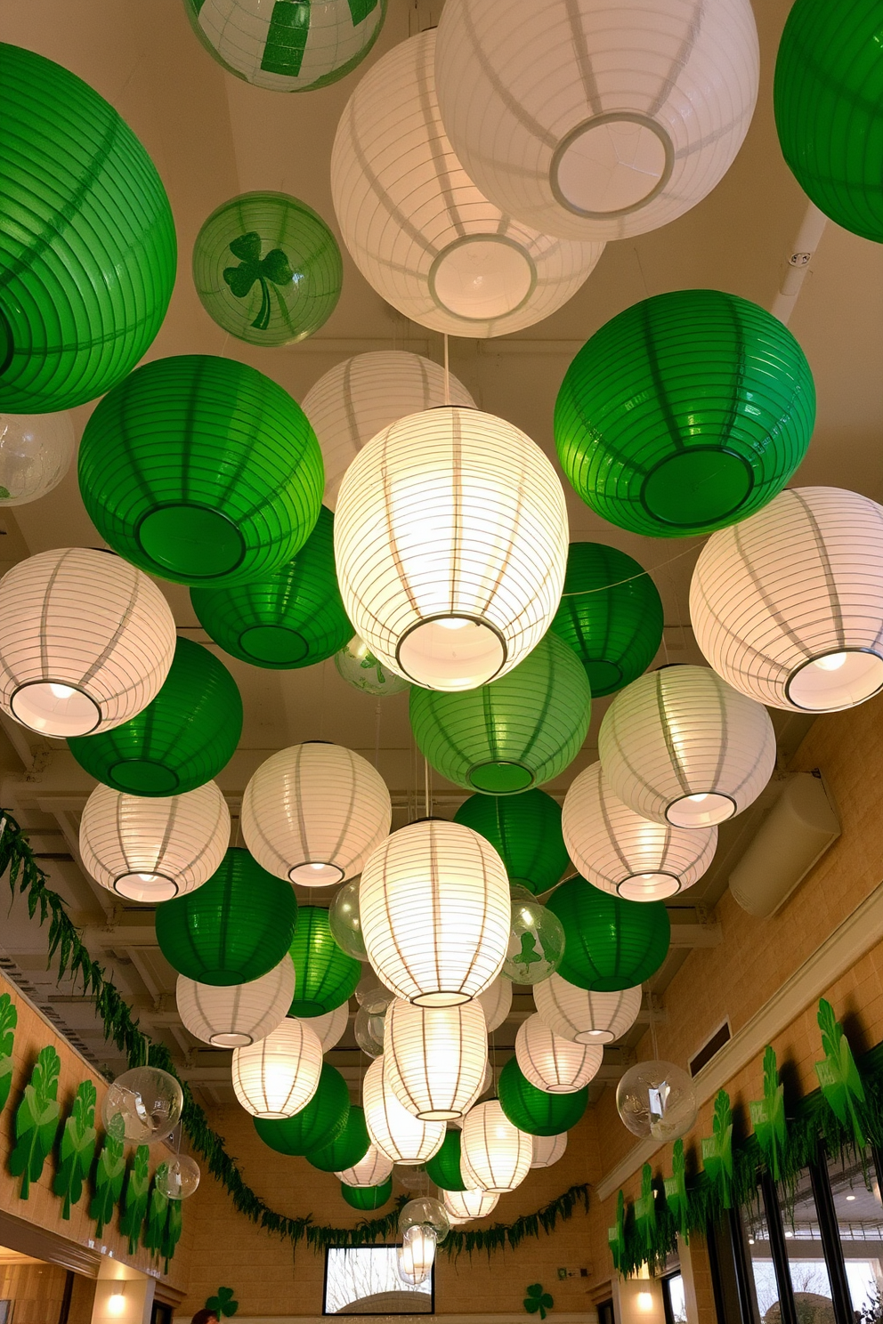 A festive St. Patrick's Day setting adorned with green and white paper lanterns hanging from the ceiling, creating a whimsical atmosphere. The lanterns are complemented by shamrock-themed decorations on the walls, enhancing the holiday spirit throughout the space.