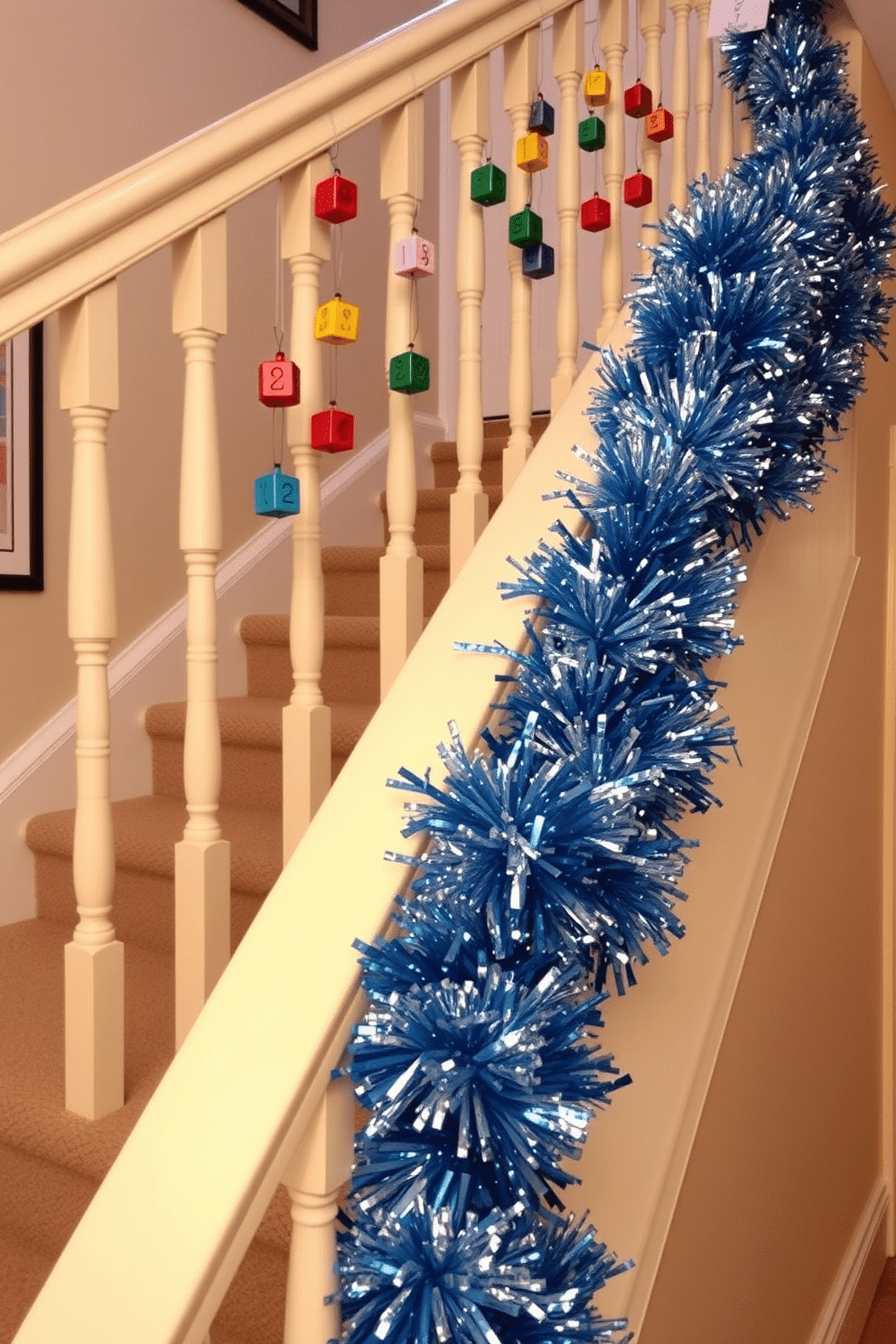 A festive staircase adorned for Hanukkah features colorful dreidels hanging from the banister, creating a cheerful and vibrant atmosphere. The banister is wrapped in shimmering garlands of blue and silver, complementing the traditional symbols of the holiday.