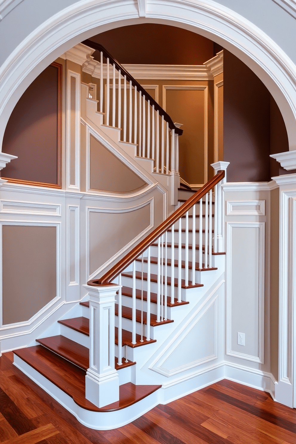 A grand staircase features elegant molding accents that enhance its architectural appeal. The walls are adorned with a combination of wainscoting and decorative paneling, creating a visually striking backdrop for the staircase. The staircase itself is framed by a sleek handrail, with each step showcasing rich hardwood that contrasts beautifully with the lighter wall colors. Accent lighting highlights the intricate molding details, casting soft shadows that add depth and sophistication to the space.