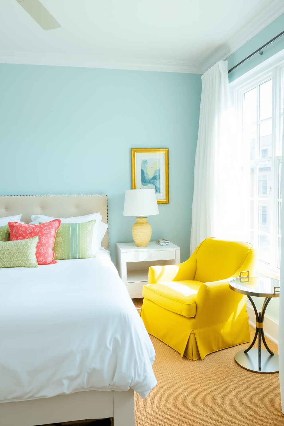 A bright and airy summer bedroom featuring a large bed with crisp white linens and colorful throw pillows. A playful accent chair in a vibrant yellow fabric adds a fun pop of color next to a small round side table. The walls are painted a soft sky blue, creating a serene atmosphere. Large windows allow natural light to flood the room, with sheer white curtains gently billowing in the breeze.