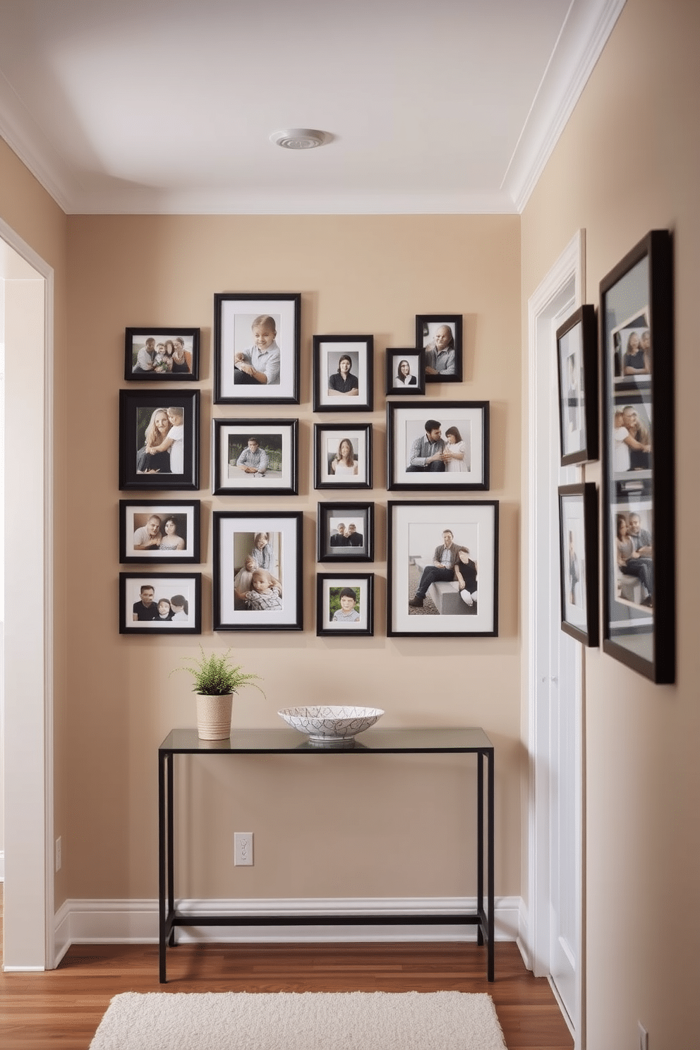 A charming hallway adorned with a gallery of family photos. The walls are painted in a soft beige tone, creating a warm and inviting atmosphere. Framed photographs of various sizes are arranged in a stylish layout, showcasing treasured memories. A narrow console table sits beneath the photo display, decorated with a small potted plant and a decorative bowl.