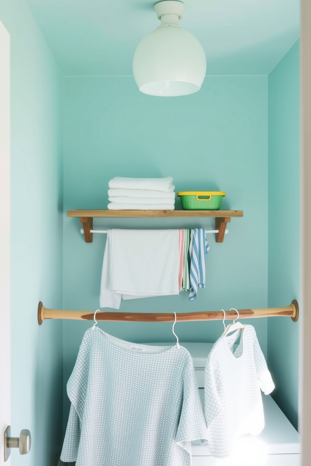 A bright and airy laundry room designed for summer vibes. The space features a hanging rod for clothes, allowing freshly laundered garments to air dry naturally. The walls are painted in a soft pastel blue, creating a cheerful atmosphere. A rustic wooden shelf above the rod holds neatly folded towels and colorful laundry baskets.