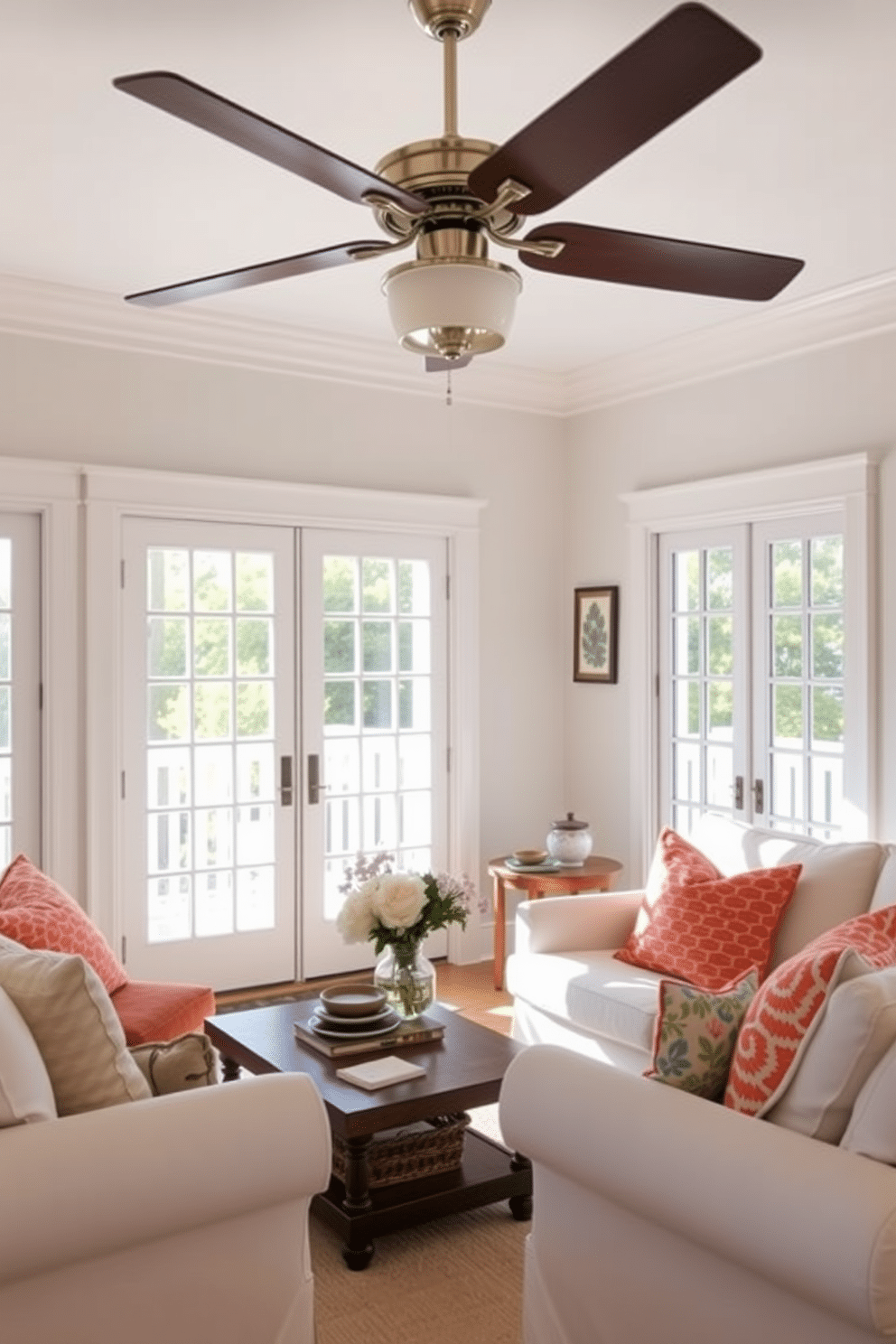 A bright and airy summer living room features a statement ceiling fan that adds a touch of elegance to the space. The room is adorned with soft, light-colored furniture and vibrant throw pillows that evoke a cheerful atmosphere.