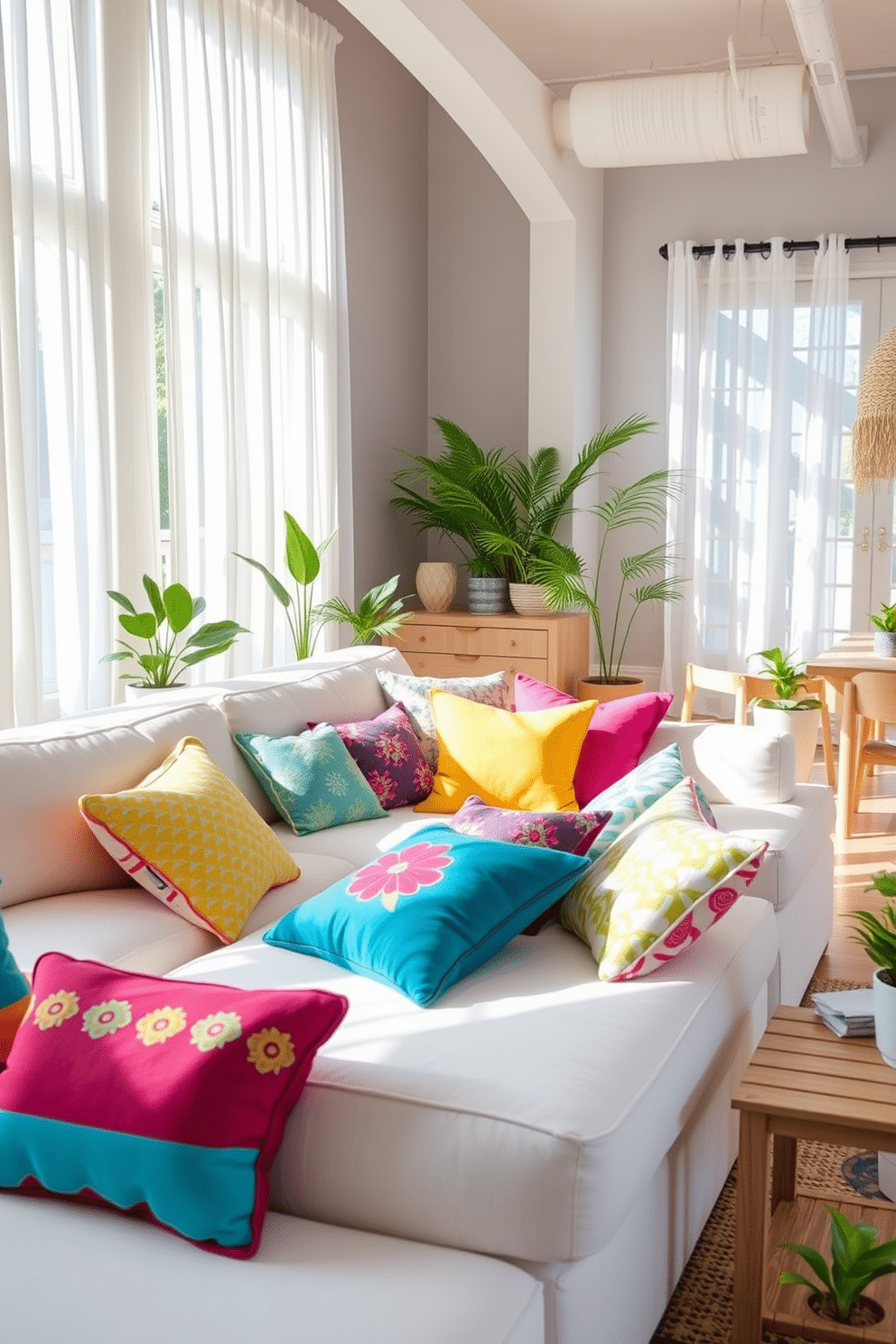 Brighten the living space with an array of colorful throw pillows scattered across a plush white sofa. The pillows feature vibrant patterns and hues, adding a playful touch to the airy loft atmosphere. Incorporate natural light by using sheer curtains that flutter gently with the summer breeze. Complement the decor with light wooden furniture and potted plants that enhance the fresh and inviting summer vibe.