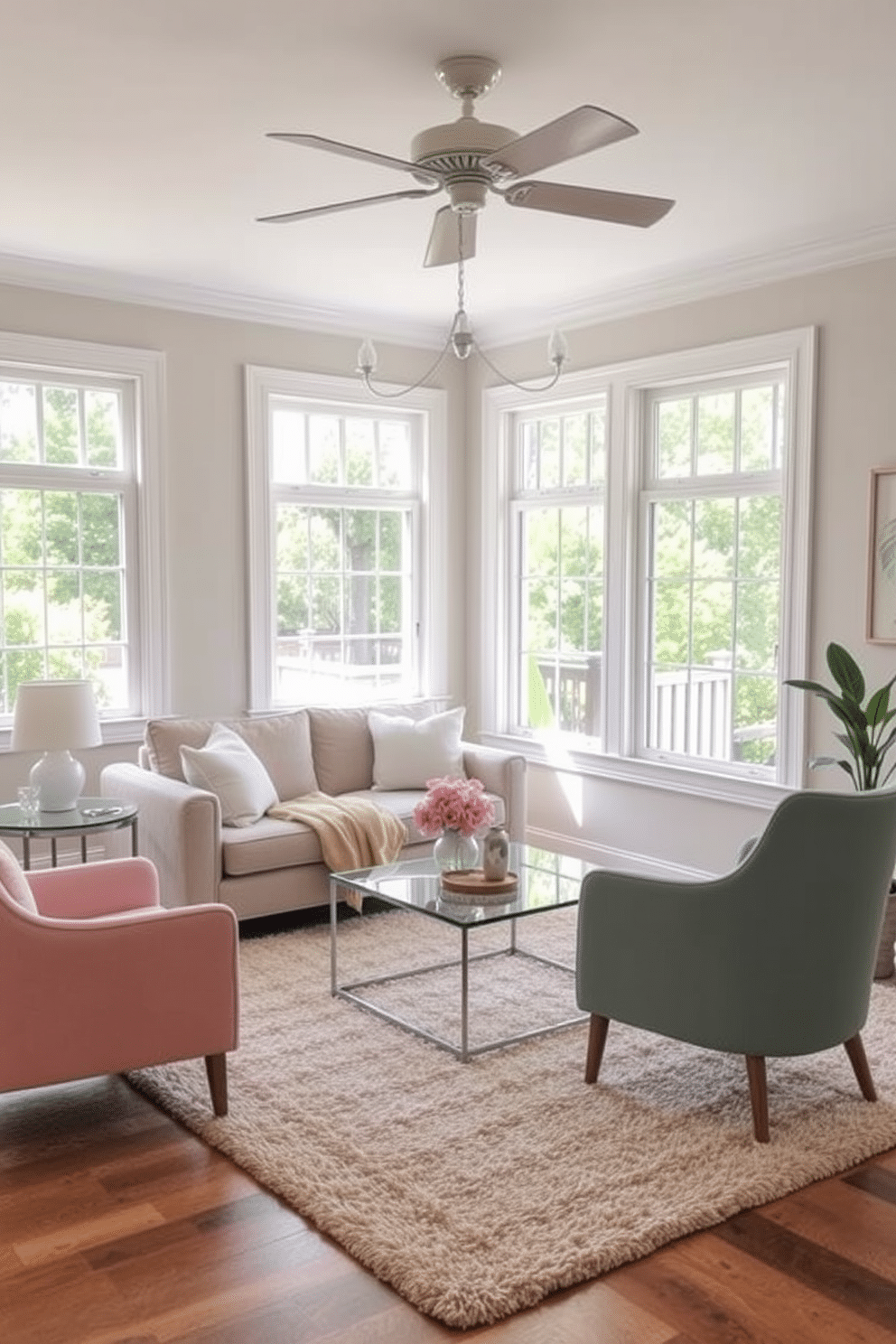 A bright and airy summer small living room features lightweight furniture that enhances the sense of space. A cozy sofa in a light fabric is paired with a glass coffee table, creating an inviting atmosphere. Accent chairs in pastel colors add a playful touch to the room. Natural light floods in through large windows, illuminating the soft area rug that ties the space together.