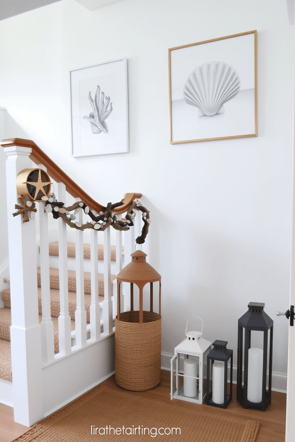 A bright and airy staircase adorned with nautical-themed decor. The walls are painted in soft white, and a large seashell print hangs prominently as a focal point. At the base of the staircase, a woven jute rug adds texture, while a collection of decorative lanterns in varying heights line the steps. A wooden railing is adorned with a garland of sea glass and driftwood, creating a coastal charm.