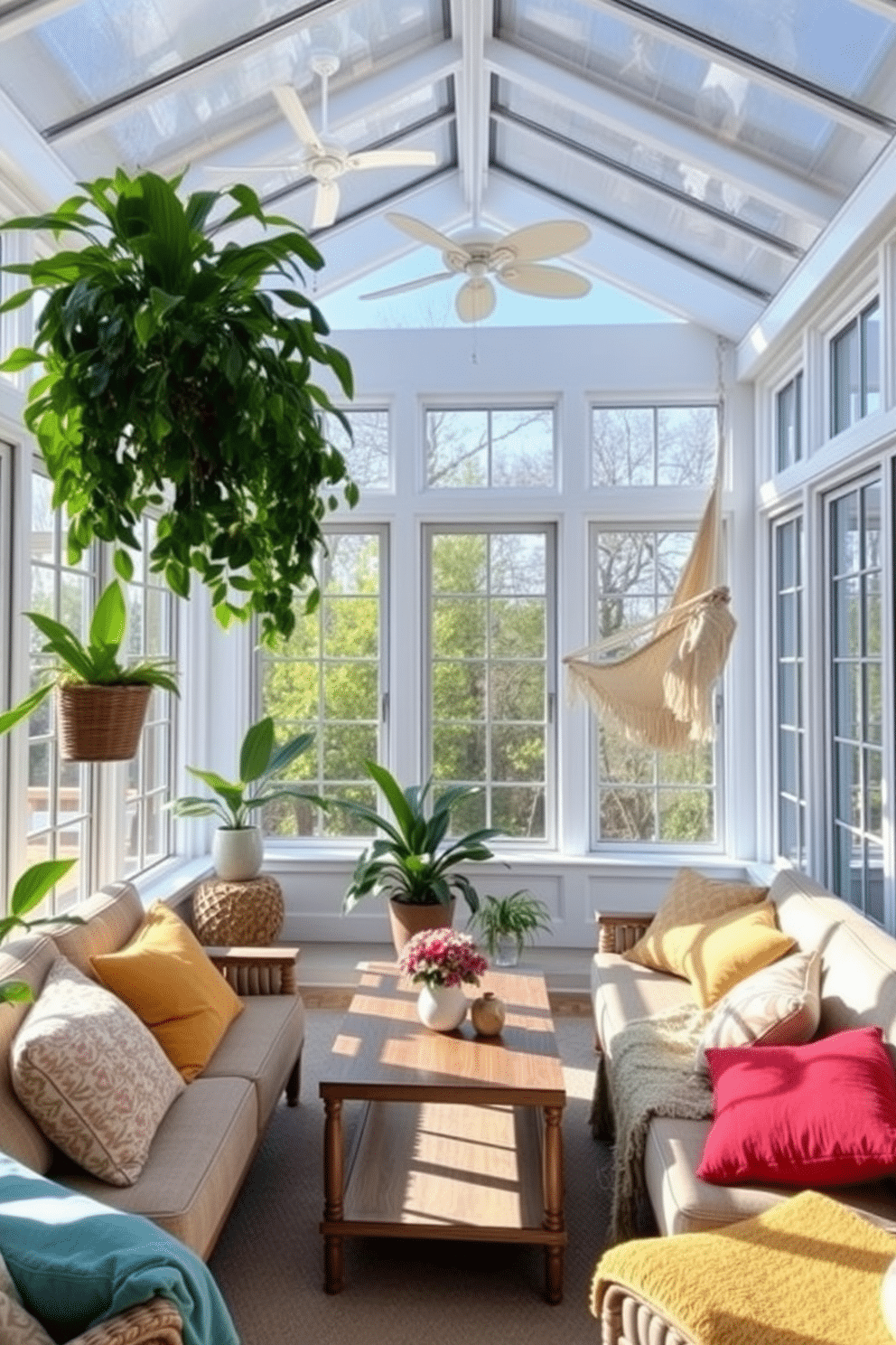 A bright and airy sunroom filled with natural light. Comfortable seating is arranged around a central coffee table, and a cozy hammock is suspended from the ceiling for relaxation. Lush green plants are placed in the corners, adding a touch of nature to the space. Soft, colorful throw pillows and blankets are scattered across the seating to enhance the inviting atmosphere.