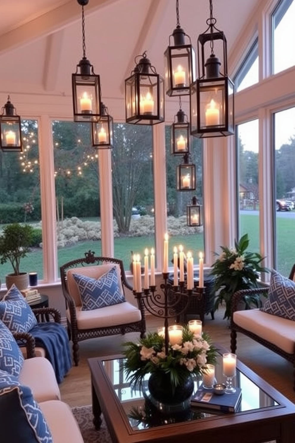 A sunroom adorned with hanging lanterns, each filled with flickering candles that cast a warm, inviting glow. The space is decorated with festive Hanukkah elements, including a beautifully arranged menorah on the coffee table and blue and silver accents throughout the room.