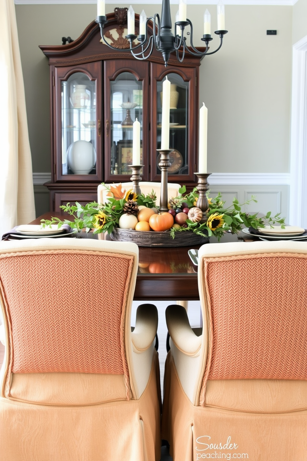 Textured pillows in warm autumn colors adorn the dining chairs, adding a cozy touch to the elegant table setting. The table is decorated with a rustic centerpiece featuring seasonal fruits, candles, and greenery to enhance the Thanksgiving ambiance.