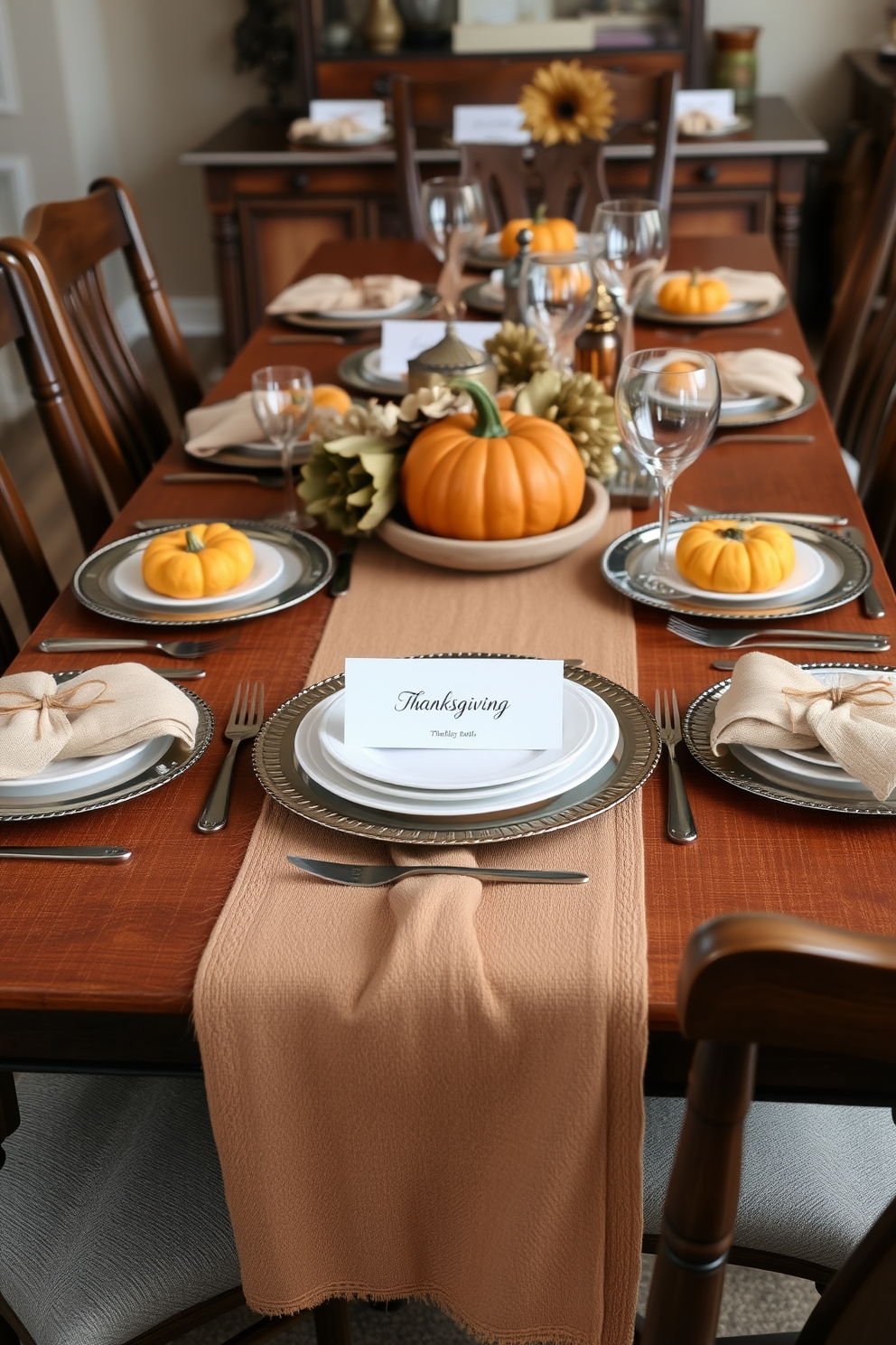 A beautifully set dining table for Thanksgiving featuring elegant decor. Miniature pumpkins serve as charming place card holders, adding a festive touch to the autumnal theme. The table is adorned with a rich, textured tablecloth in warm earth tones. Surrounding the table are rustic wooden chairs, each draped with a soft, neutral-toned throw.