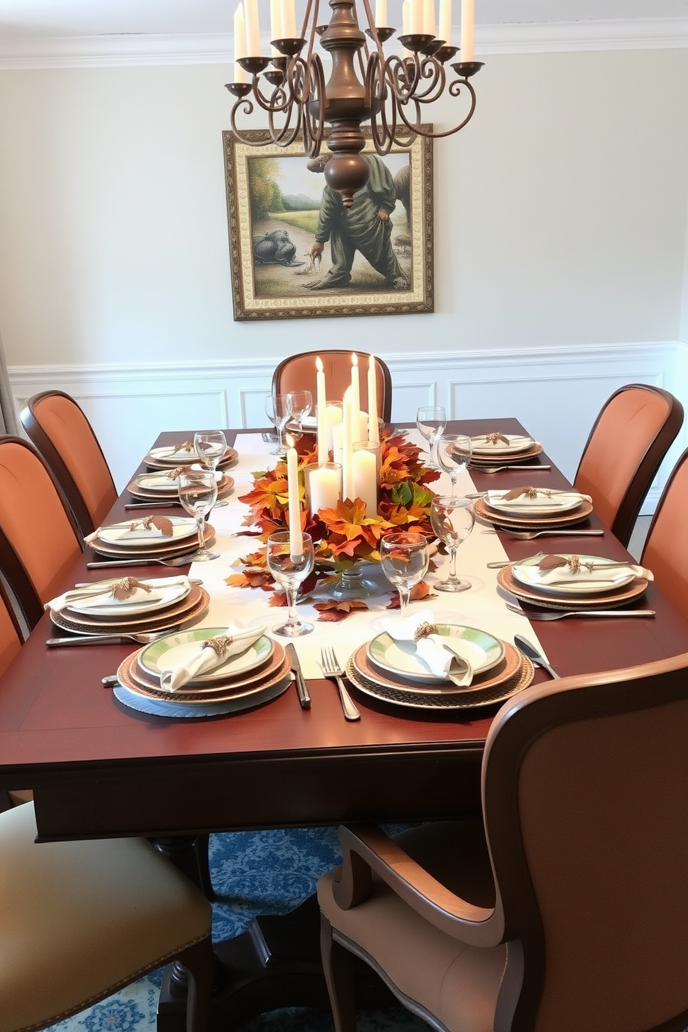 A beautifully arranged Thanksgiving dining table features a rich wooden table adorned with a crisp white tablecloth. Mixed vintage flatware is artfully placed at each setting, complemented by elegant china and seasonal centerpieces of autumn leaves and candles. The chairs are upholstered in warm, earthy tones, inviting guests to gather comfortably. Soft lighting from a chandelier above casts a warm glow, enhancing the festive atmosphere of the room.