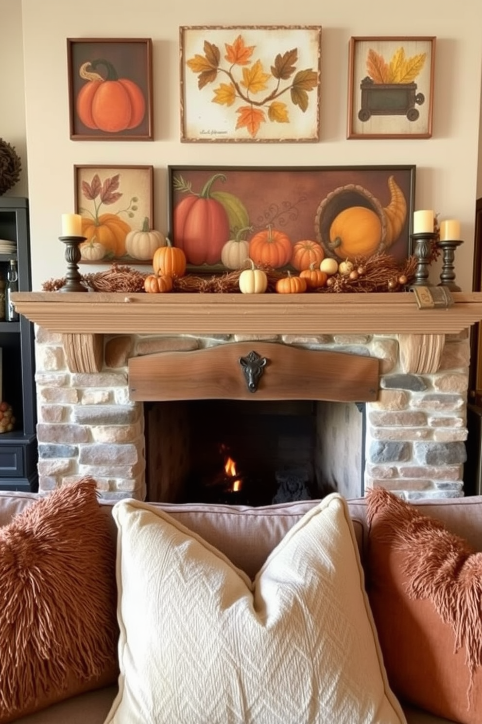 A cozy living room setting with a rustic fireplace as the focal point. Above the fireplace, there is a collection of harvest-themed wall art featuring pumpkins, autumn leaves, and cornucopias. The mantel is adorned with seasonal decorations including small gourds and candles in warm tones. Plush throw pillows in earthy colors are arranged on a comfortable sofa, enhancing the inviting atmosphere for Thanksgiving gatherings.