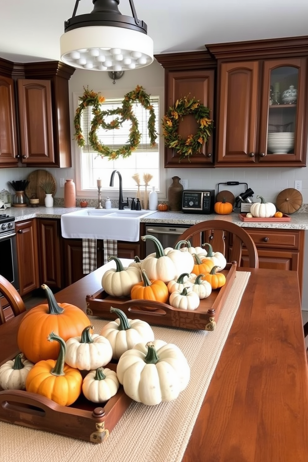 A cozy kitchen adorned for Thanksgiving. Mini pumpkins in various sizes and colors are artfully arranged as table accents, complementing rustic wooden serving trays and warm autumnal decor.