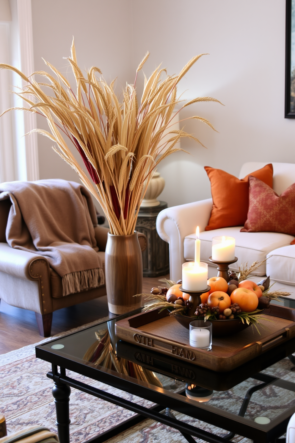 Artful arrangements of dried corn stalks create a warm and inviting atmosphere in the living room. The corn stalks are elegantly displayed in a rustic wooden vase, surrounded by soft, plush pillows in autumnal hues. Thanksgiving living room decorating ideas include a cozy throw blanket draped over a stylish armchair. A centerpiece of seasonal fruits and candles adorns the coffee table, enhancing the festive spirit of the space.