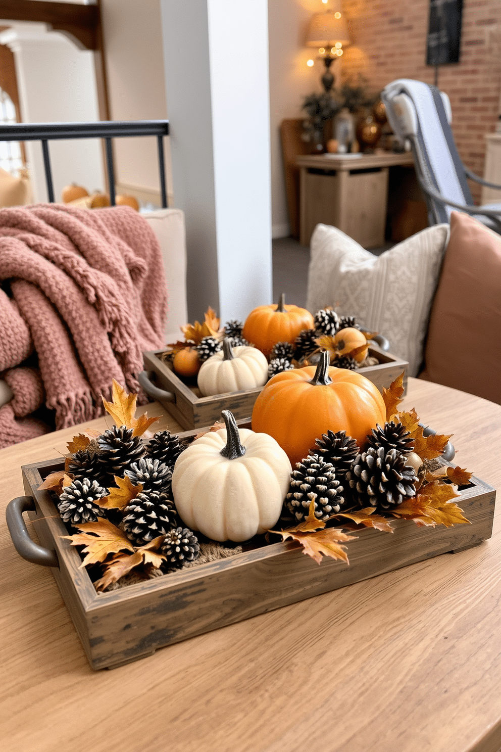 Decorative trays adorned with seasonal items create a warm and inviting atmosphere in a loft space. The trays are filled with pumpkins, pinecones, and autumn leaves, beautifully arranged to celebrate the Thanksgiving season. In the background, soft lighting enhances the cozy ambiance, highlighting the textures of the decorations. Plush throw blankets and cushions in earthy tones complement the seasonal display, making the loft feel both stylish and comfortable.