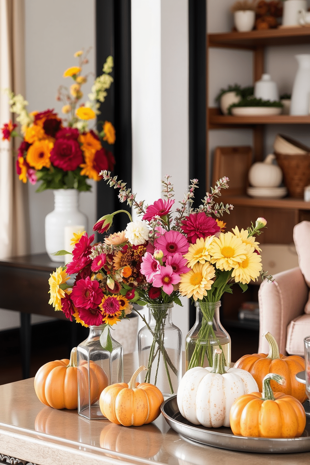 Seasonal floral arrangements in vases. Brightly colored flowers in a variety of vases create a warm and inviting atmosphere. Thanksgiving Loft Decorating Ideas. Cozy textiles and rich autumn colors enhance the space, with decorative pumpkins and gourds adding seasonal charm.