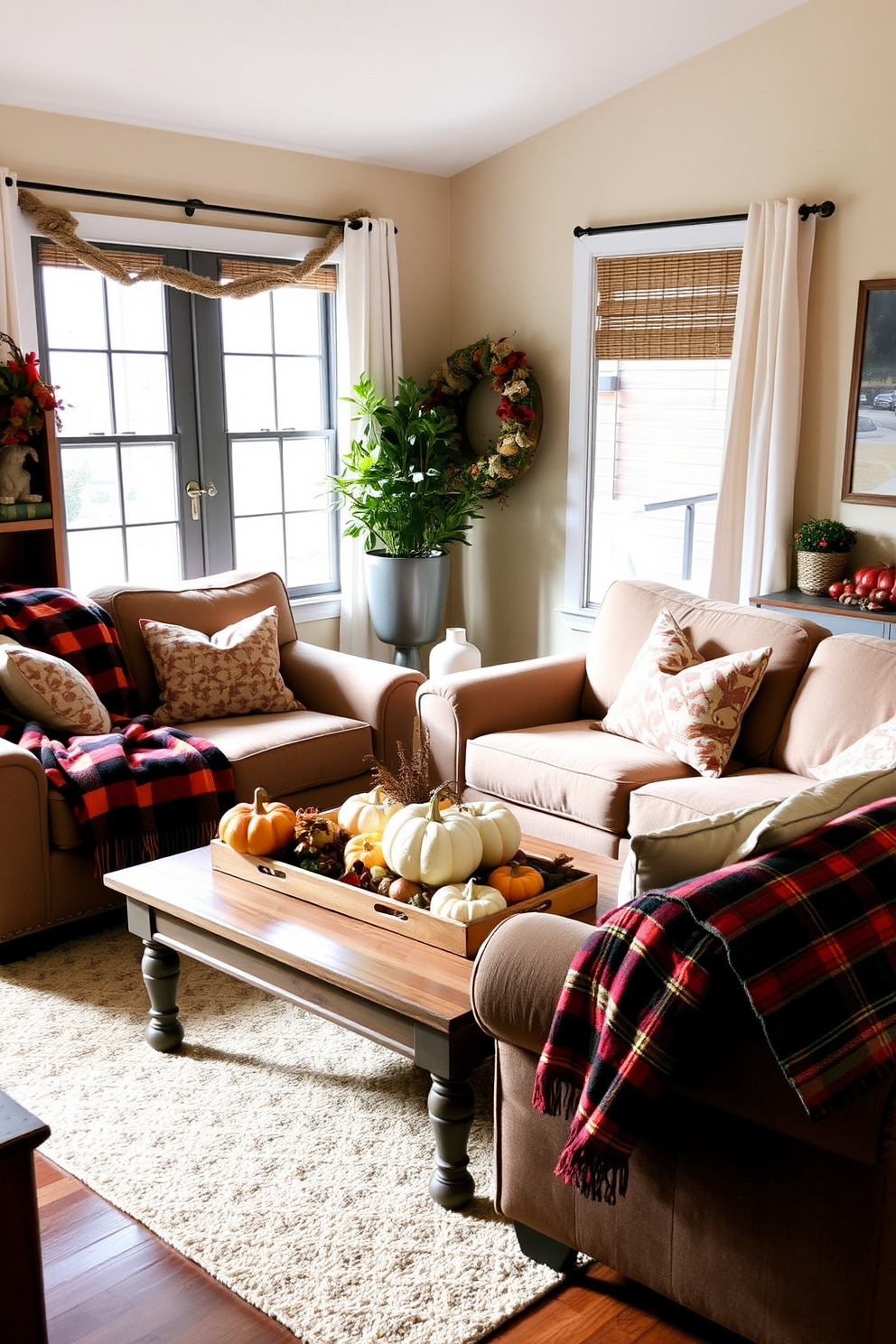 A cozy small living room decorated for Thanksgiving features warm plaid throw blankets draped over plush sofas. The space is adorned with autumn-themed decor, including pumpkins and a rustic coffee table centerpiece.