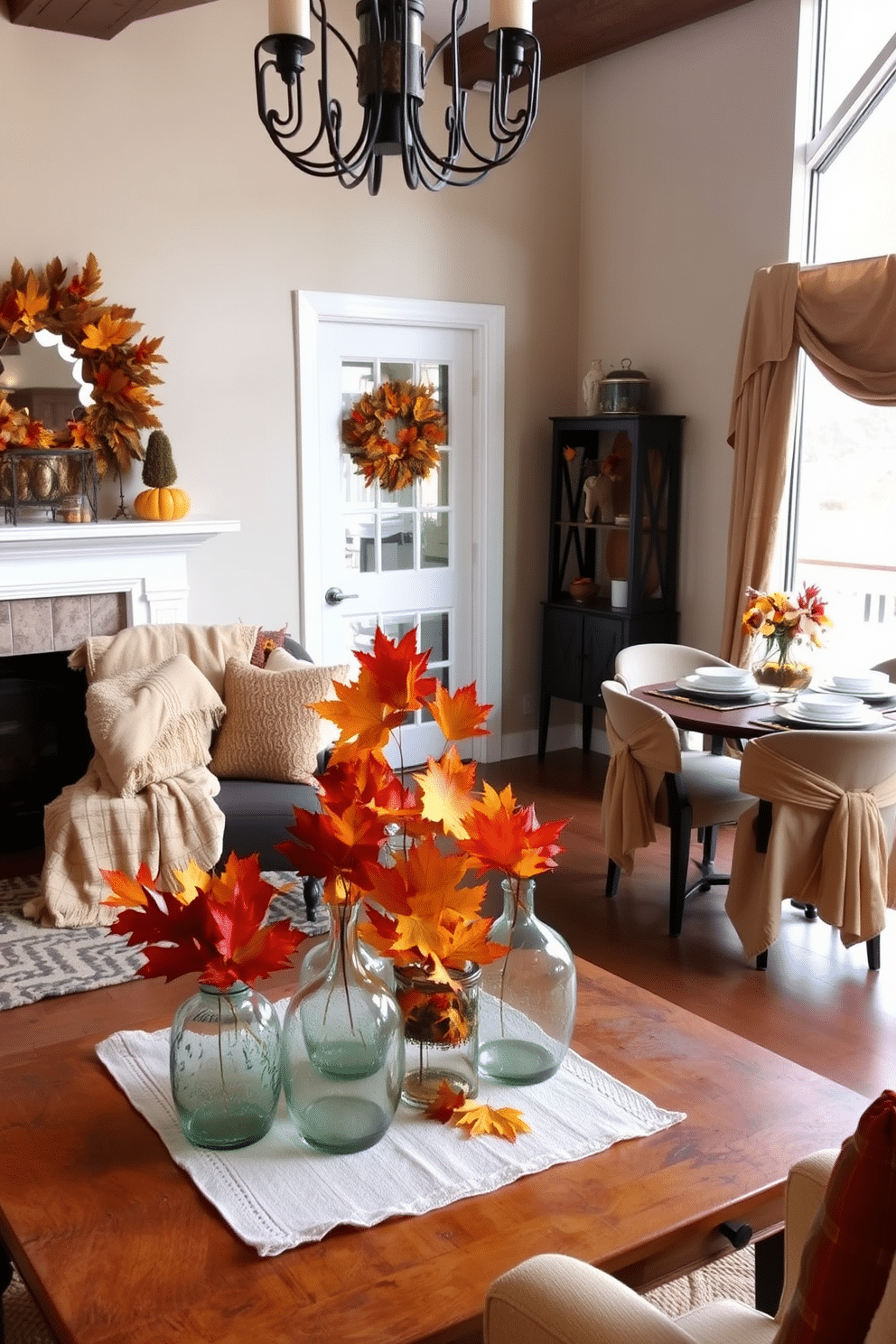 A cozy living room featuring an array of glass vases filled with colorful autumn leaves. The vases are arranged on a rustic wooden coffee table, complemented by soft throw blankets and seasonal decorations. A compact dining area adorned with Thanksgiving-themed accents. A small table is set with elegant dishes, surrounded by chairs draped with warm, earthy-toned fabrics to enhance the festive atmosphere.