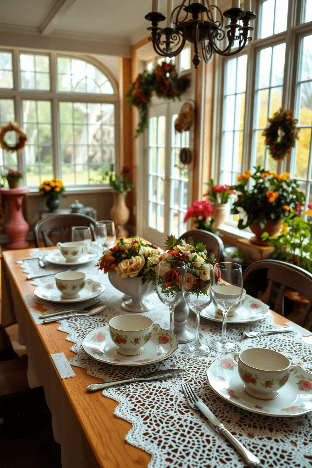 A vintage-style table is elegantly set for a Thanksgiving gathering. Delicate china plates with floral patterns are placed atop lace table runners, accompanied by polished silver cutlery and crystal glassware. The sunroom is adorned with warm, inviting colors and an abundance of natural light. Potted plants and seasonal decorations enhance the cozy atmosphere, creating a perfect backdrop for festive celebrations.