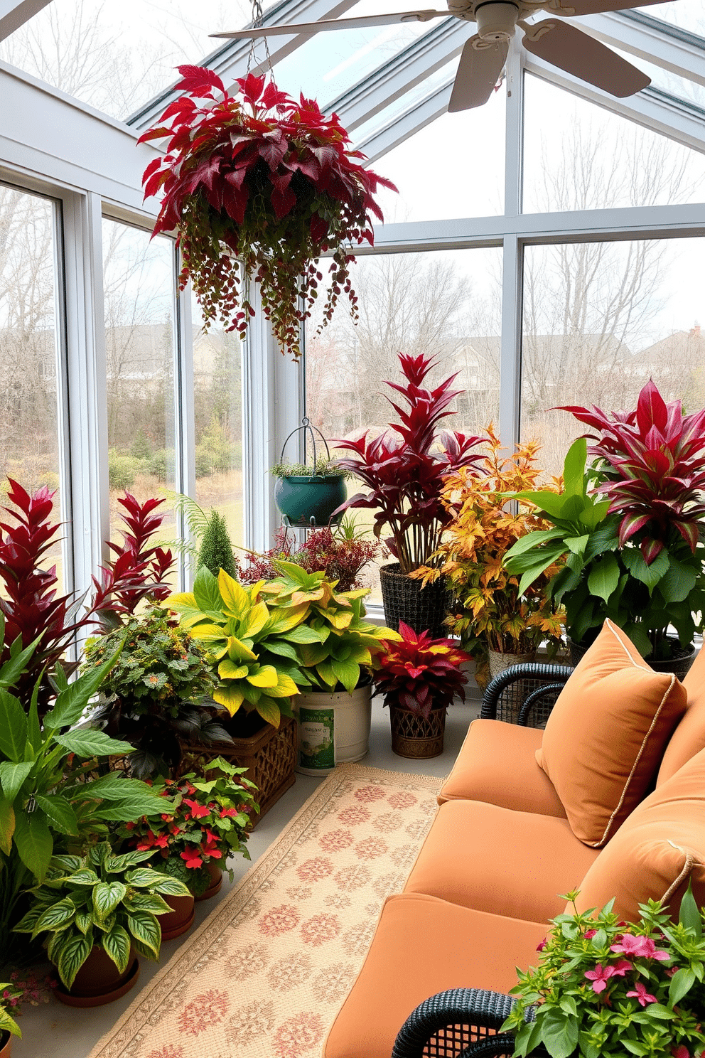 A cozy sunroom filled with an array of vibrant plants showcasing rich fall colors. The space is adorned with warm-toned cushions on a comfortable seating area, creating an inviting atmosphere perfect for Thanksgiving gatherings.