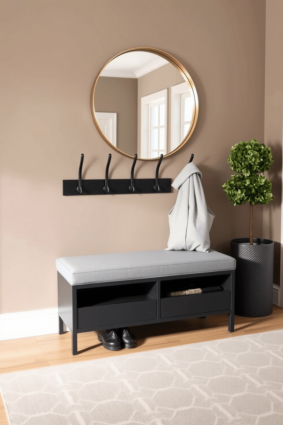 A stylish coat rack with an integrated storage bench greets you as you enter the townhouse, combining functionality with modern aesthetics. The coat rack features sleek, minimalist hooks in a matte black finish, while the bench is upholstered in a soft gray fabric, providing a cozy spot to sit and remove shoes. The entryway walls are painted in a warm taupe, creating an inviting atmosphere, complemented by a geometric patterned rug in muted tones. Above the bench, a large round mirror with a brushed gold frame reflects light, making the space feel larger and brighter.