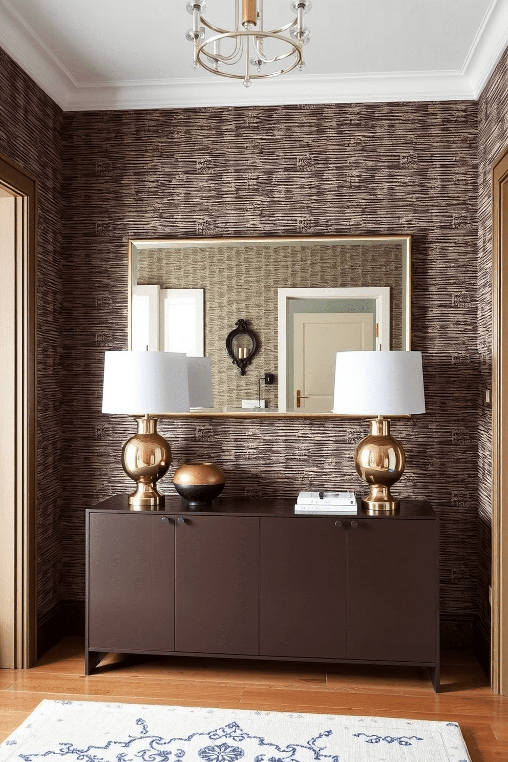 A stylish townhouse entryway features textured wallpaper that adds depth and visual interest, creating an inviting atmosphere. The space includes a sleek console table adorned with decorative accents, and a large mirror above it enhances the sense of openness.