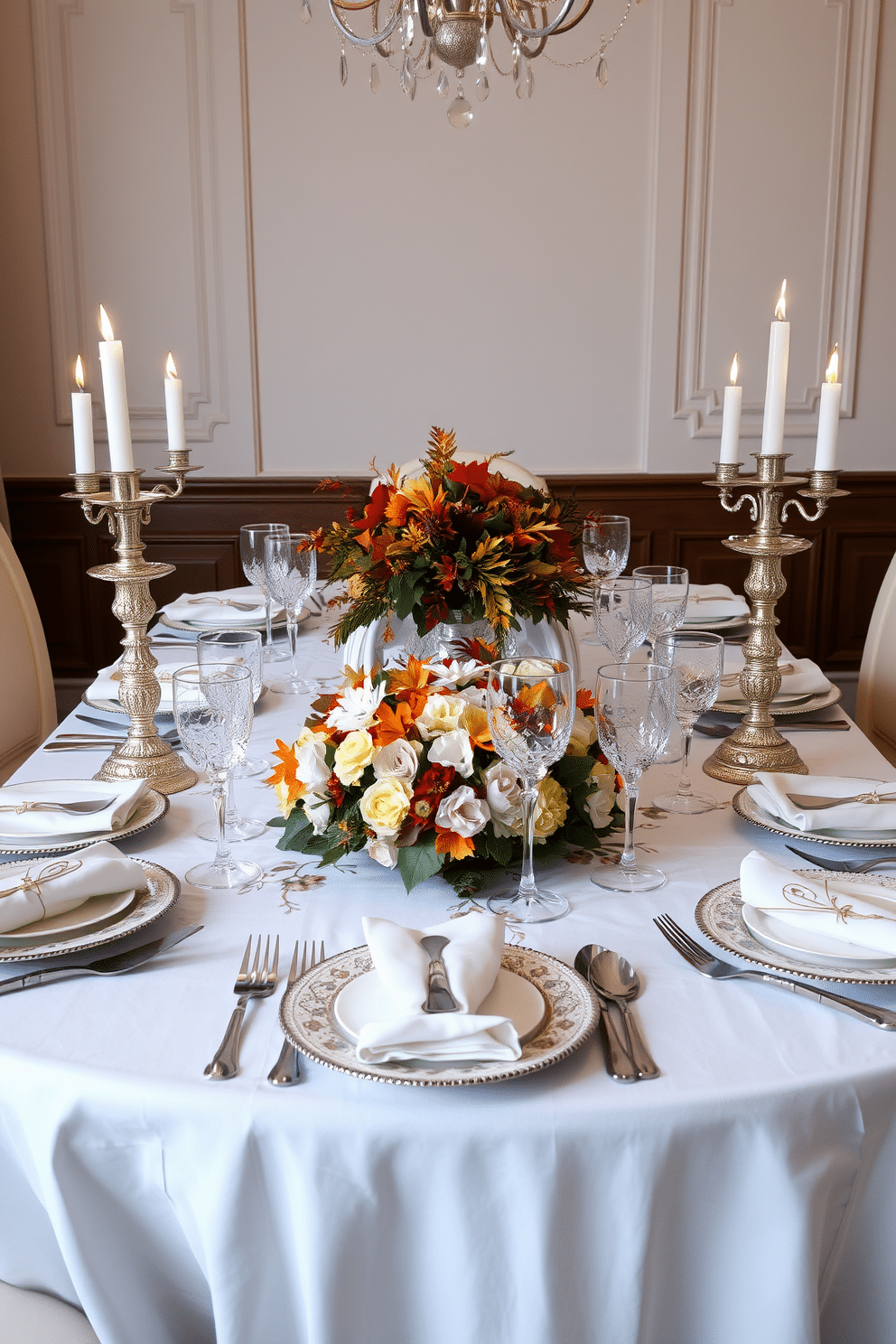 A beautifully set table for festive gatherings features an elegant white tablecloth adorned with gold and silver accents. The table is arranged with fine china, sparkling crystal glassware, and polished silver cutlery, creating a warm and inviting atmosphere. In the center, a lush floral arrangement in rich autumn colors adds a touch of vibrancy. Soft candlelight flickers from ornate cand holders, enhancing the ambiance for memorable celebrations with family and friends.