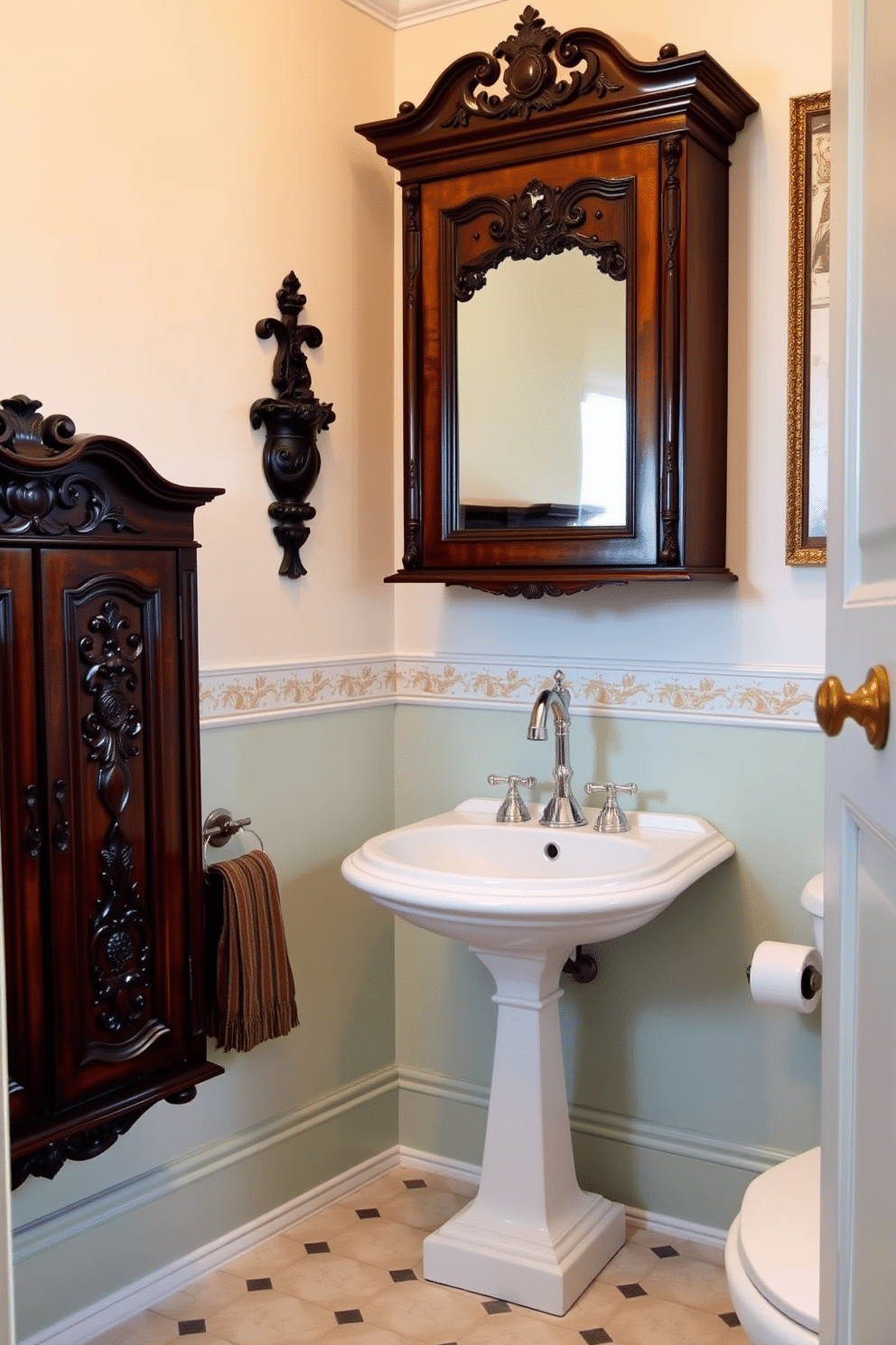 A charming Victorian powder room featuring ornate antique storage cabinets for toiletries. The cabinets, adorned with intricate carvings and a rich mahogany finish, provide both elegance and functionality in this beautifully styled space. The walls are painted in a soft pastel hue, complemented by a vintage wallpaper border that adds a touch of sophistication. A classic pedestal sink with a polished chrome faucet sits between the cabinets, while a large, framed mirror reflects the room's luxurious details.