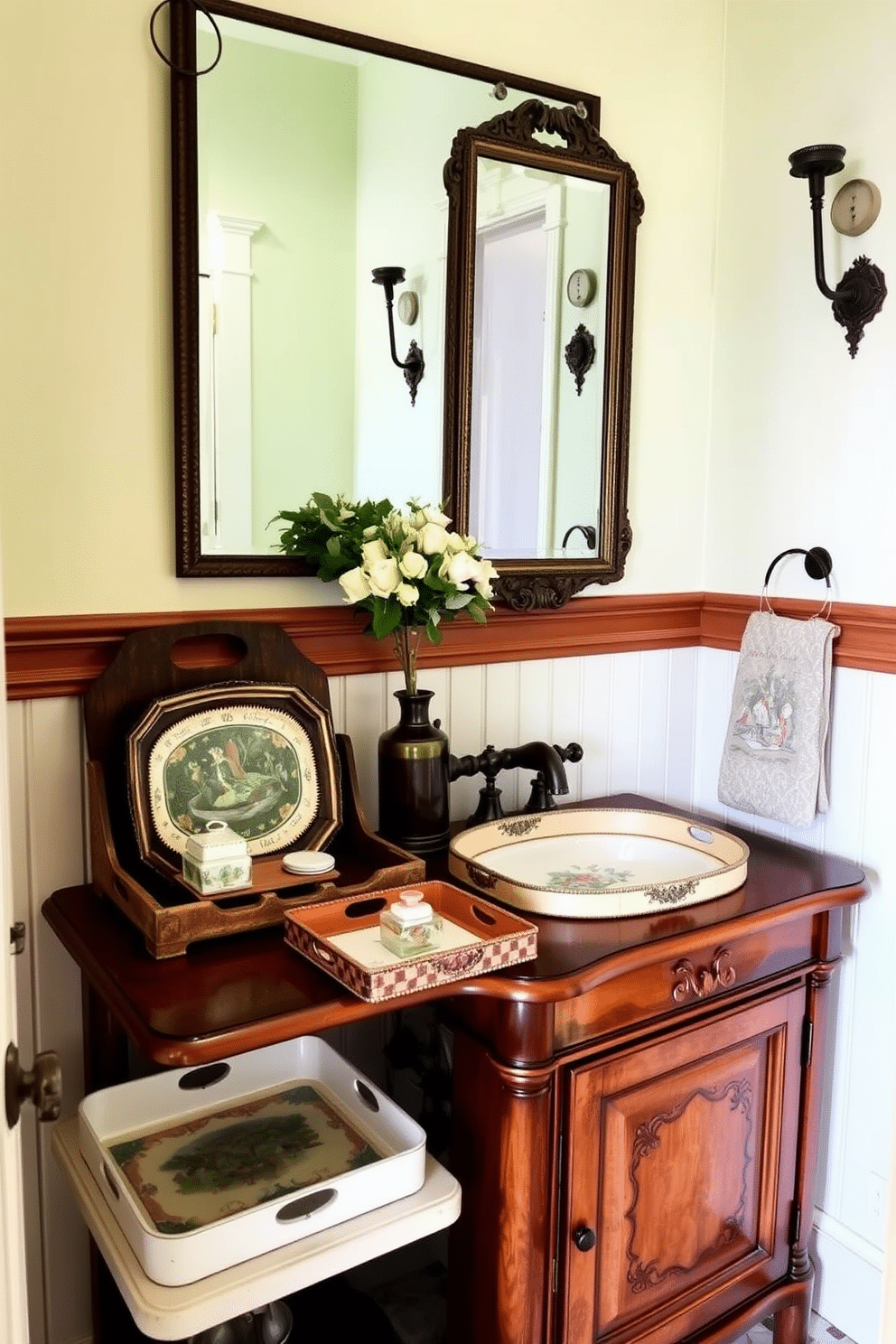 A charming vintage powder room featuring decorative vintage trays arranged on a wooden vanity for organization. The walls are painted a soft pastel hue, and the space is accented with ornate fixtures and a large, framed mirror above the sink.