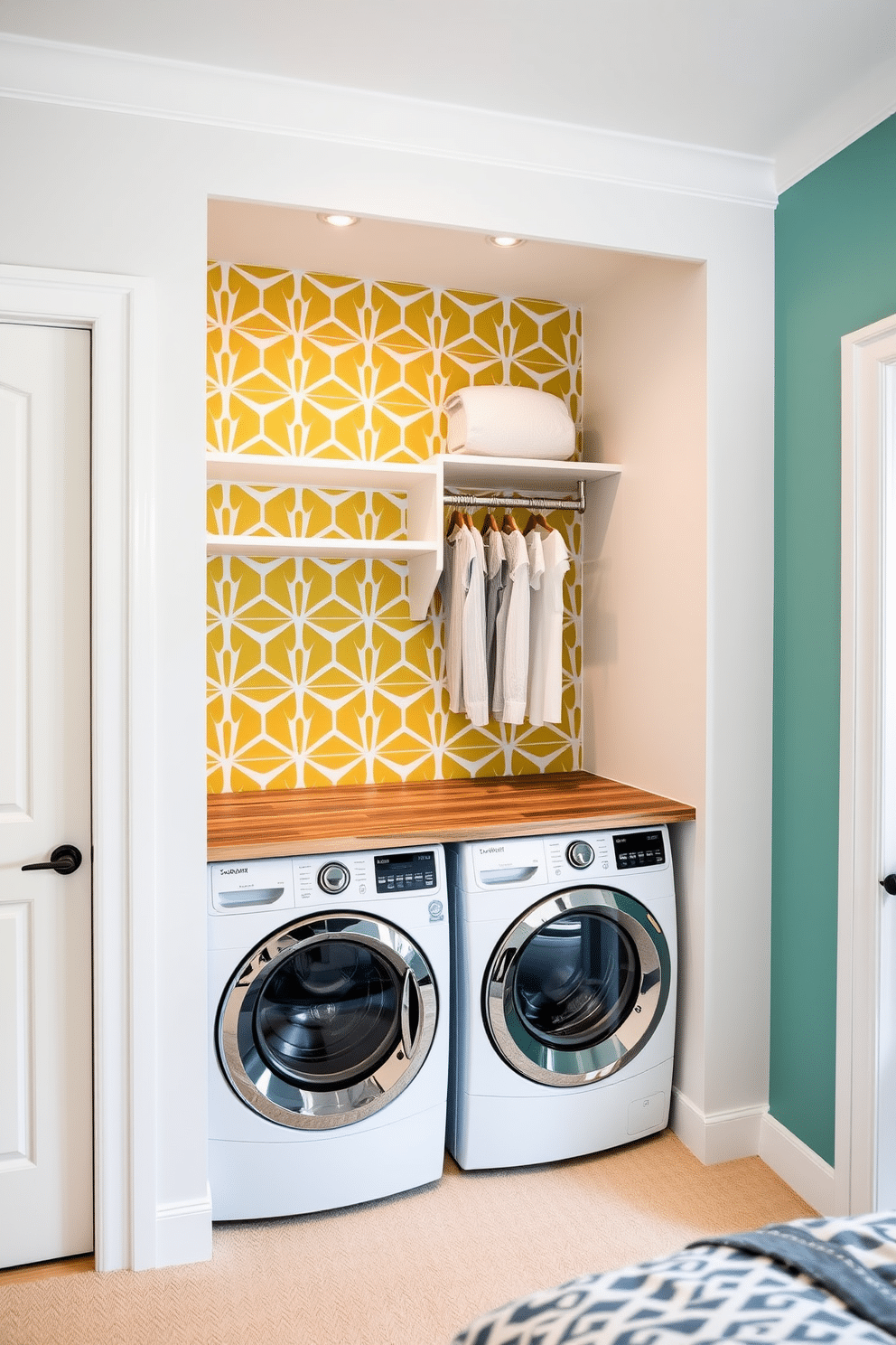 A vibrant accent wall features a bold geometric pattern in shades of teal, mustard yellow, and coral, creating a striking focal point in the room. The surrounding walls are painted in a soft white to enhance the brightness and draw attention to the colorful design. The walk-in closet is designed with custom shelving and hanging space, seamlessly integrated with a functional laundry area. A stylish washer and dryer sit beneath a countertop made of reclaimed wood, providing both practicality and a warm, inviting atmosphere.