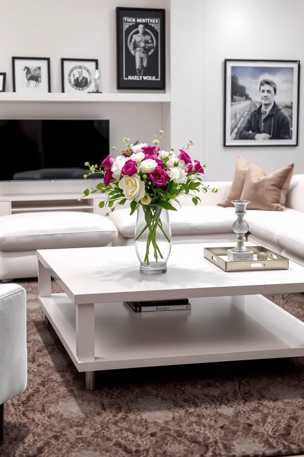 Elegant white coffee table centerpiece. A stunning arrangement of fresh flowers in a minimalist vase sits atop the table, complemented by a few stylish coffee table books and a decorative tray. White Man Cave Design Ideas. The space features a plush, oversized sectional sofa in a light color, paired with a sleek, modern entertainment unit and framed artwork that reflects personal interests.