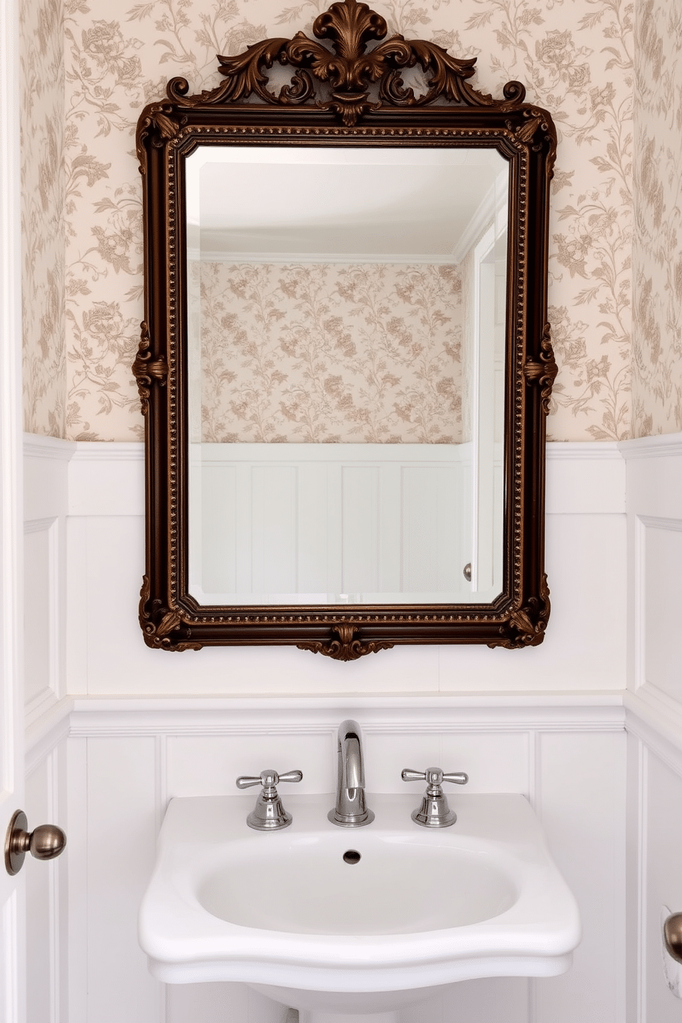 A vintage mirror with an ornate frame is mounted above a sleek, modern sink with minimalist chrome fixtures. The walls are adorned with soft white wainscoting, complemented by a delicate floral wallpaper above, creating a timeless elegance in the powder room.