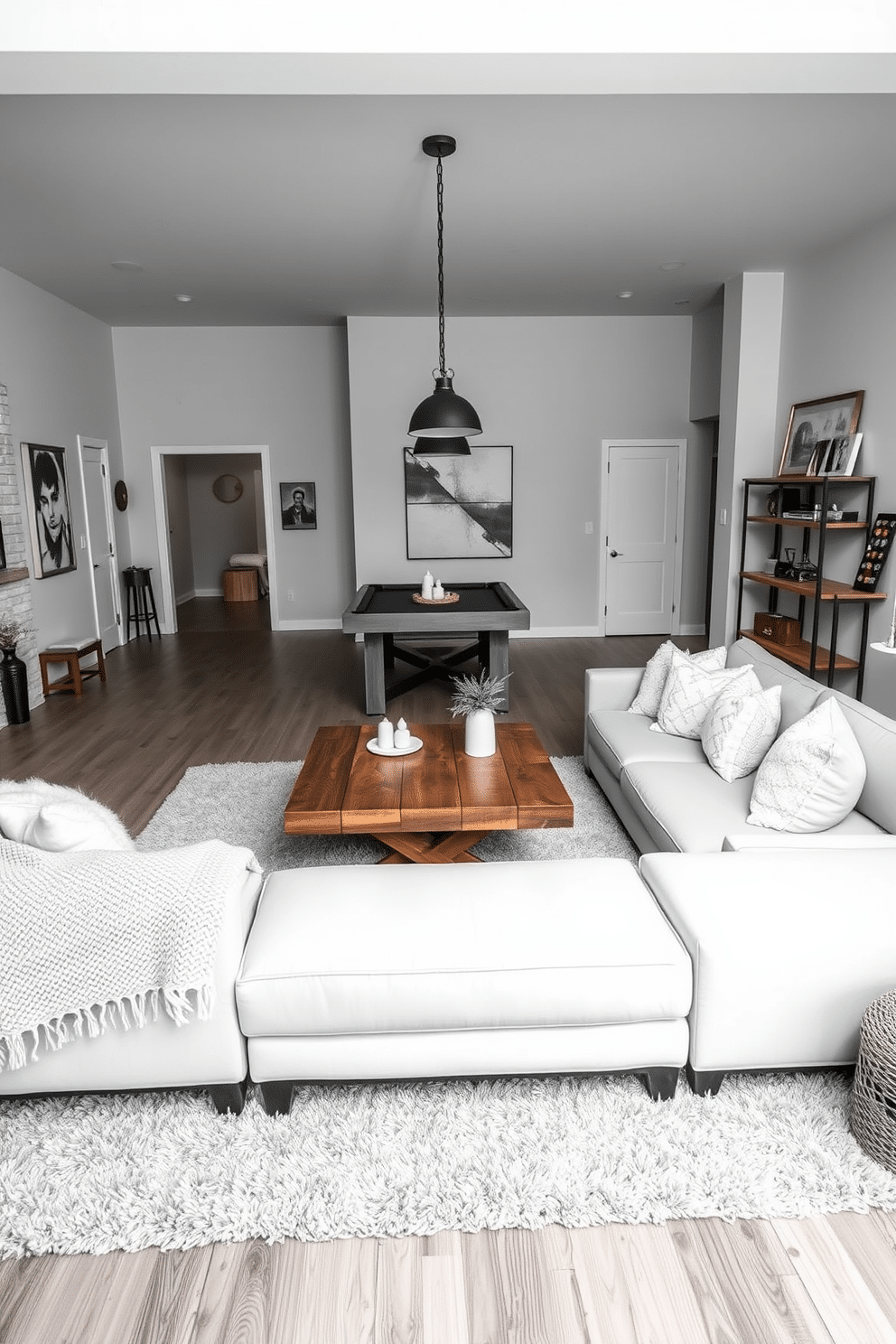 A cozy winter game room featuring a neutral color palette with soft whites, grays, and taupes. The space includes a large sectional sofa adorned with plush throw pillows and a textured knit blanket, inviting relaxation and warmth. A rustic wooden coffee table sits in the center, surrounded by a plush area rug that adds comfort underfoot. On one side, a sleek pool table is accented by modern pendant lighting, while a wall-mounted shelf displays winter-themed decor and board games for entertainment.